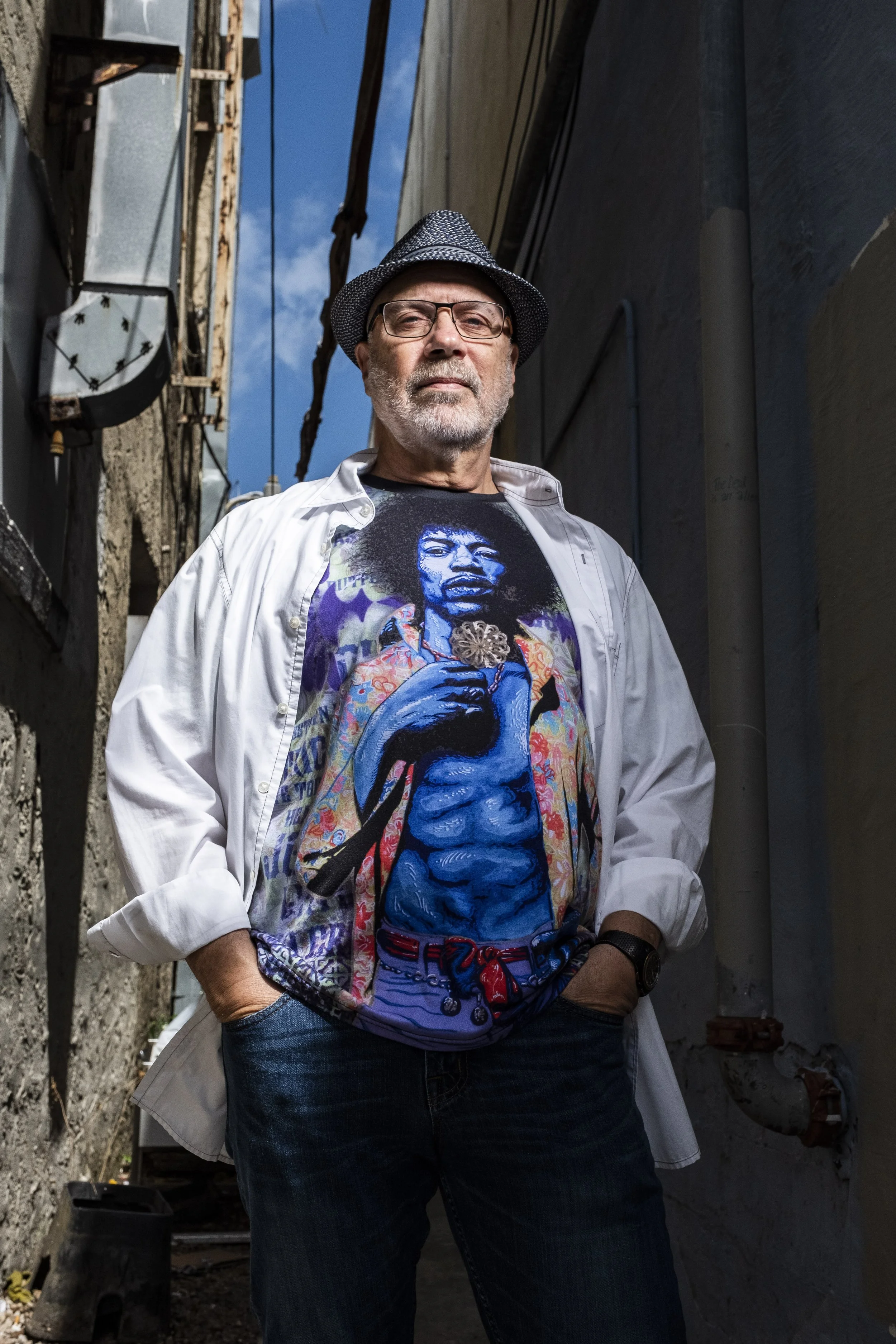 Man with a hat, artist, in a city alleyway, dramatic lighting | Fuse Mediaworks | West Palm Beach | Portrait Photographer.jpg