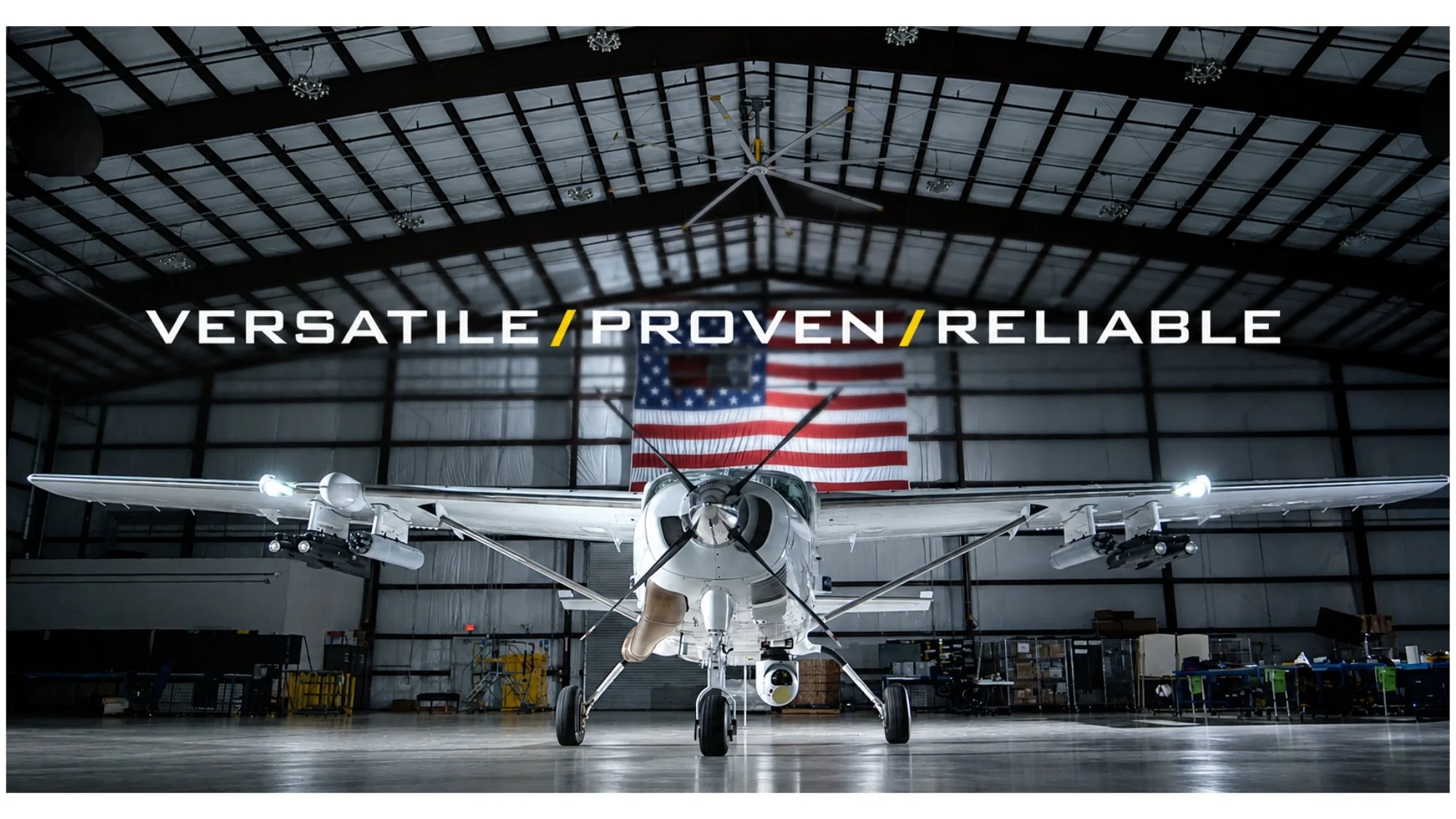 Aircraft inside a hangar beneath the words Versatile, Proven, Reliable, from Paul Piasecki’s branded content cinematography portfolio.