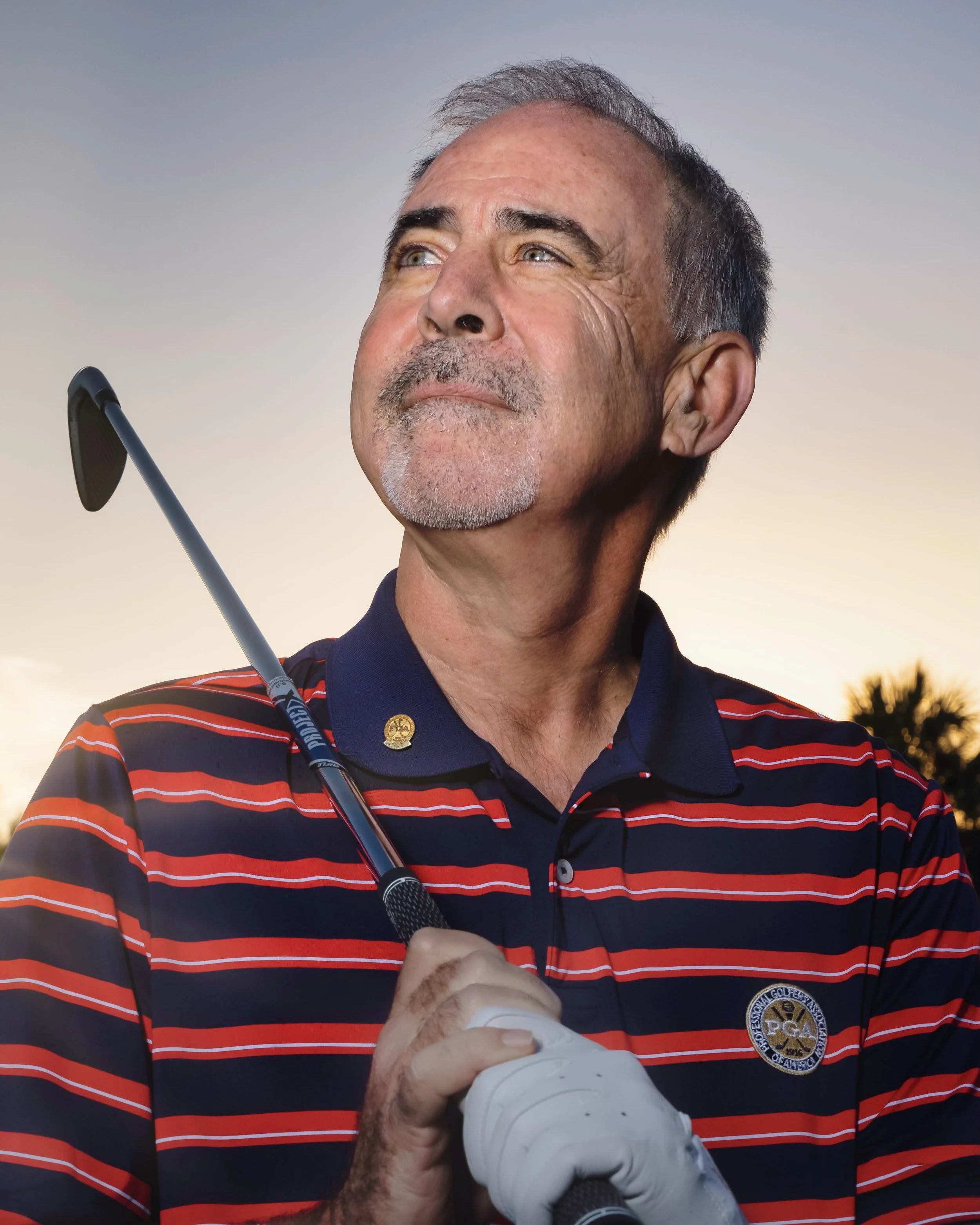 Golf Professional Portrait

Professional golf instructor portrait photographed on a pristine South Florida golf course using natural light for commercial branding, website marketing, and editorial promotion.