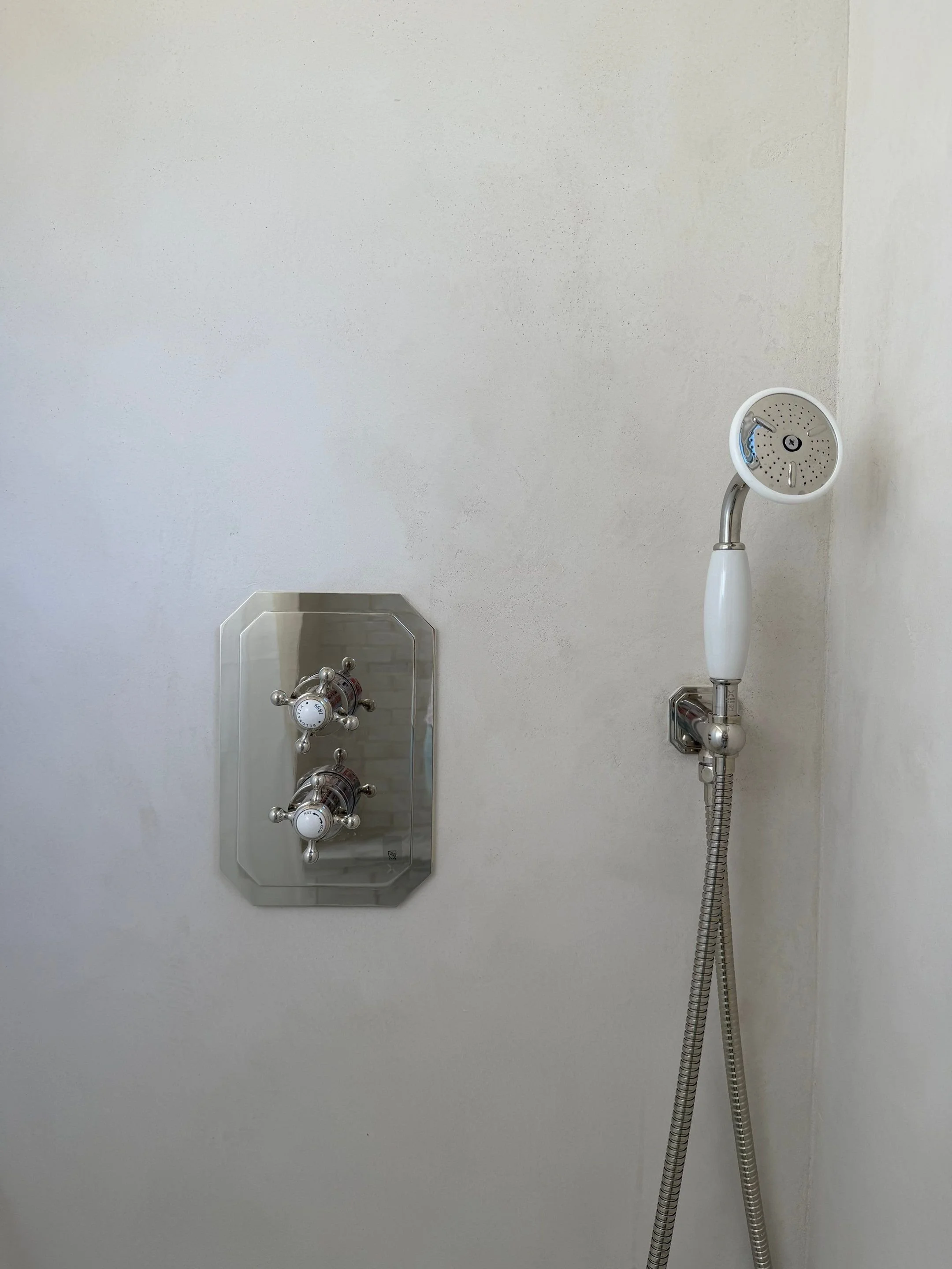 Detail of the shower valve and handheld sprayer — Discovery Park, Seattle whole-home addition