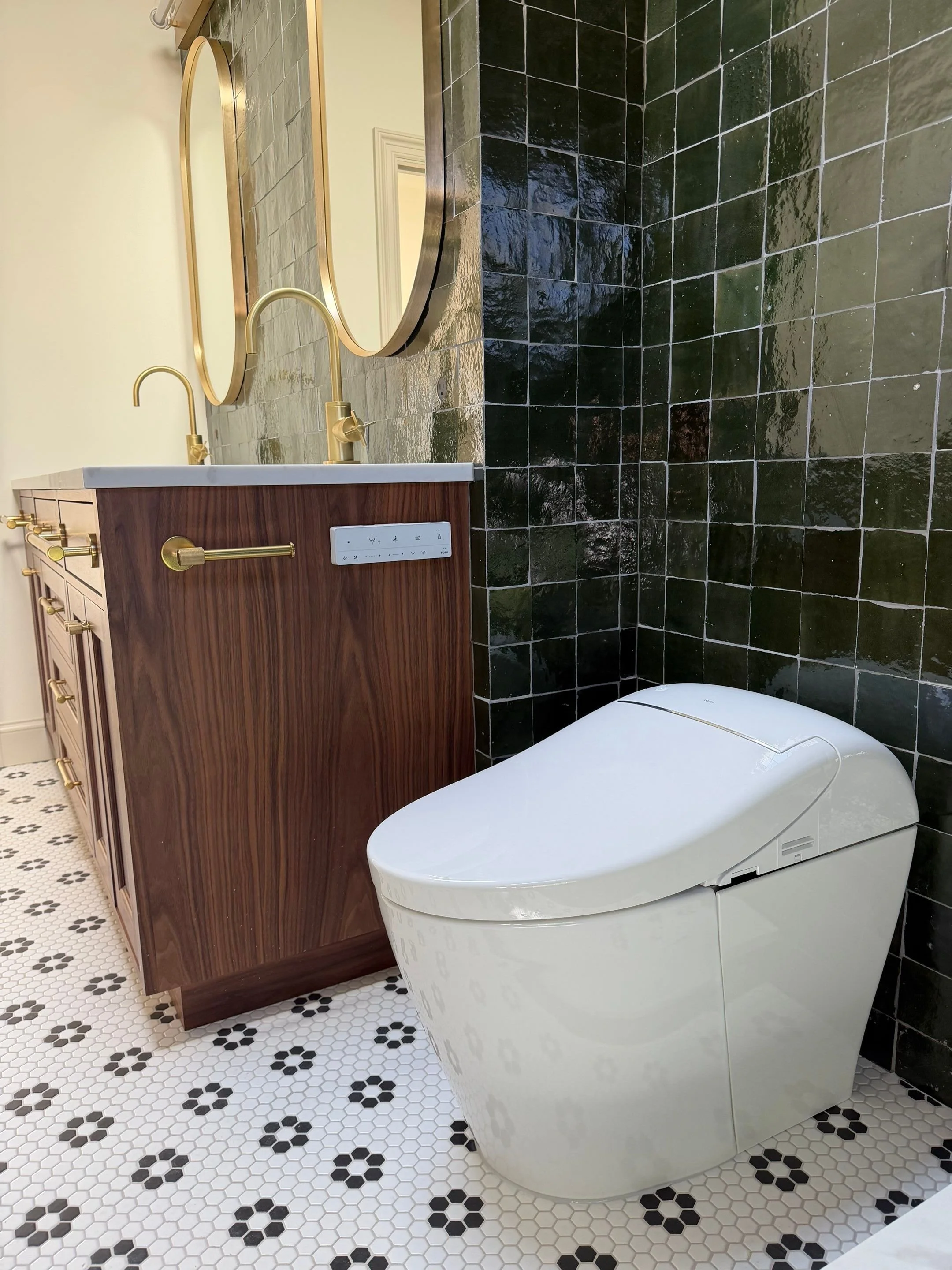 Toilet area with dark green hexagonal tile and patterned floor tile — Discovery Park, Seattle whole-home addition