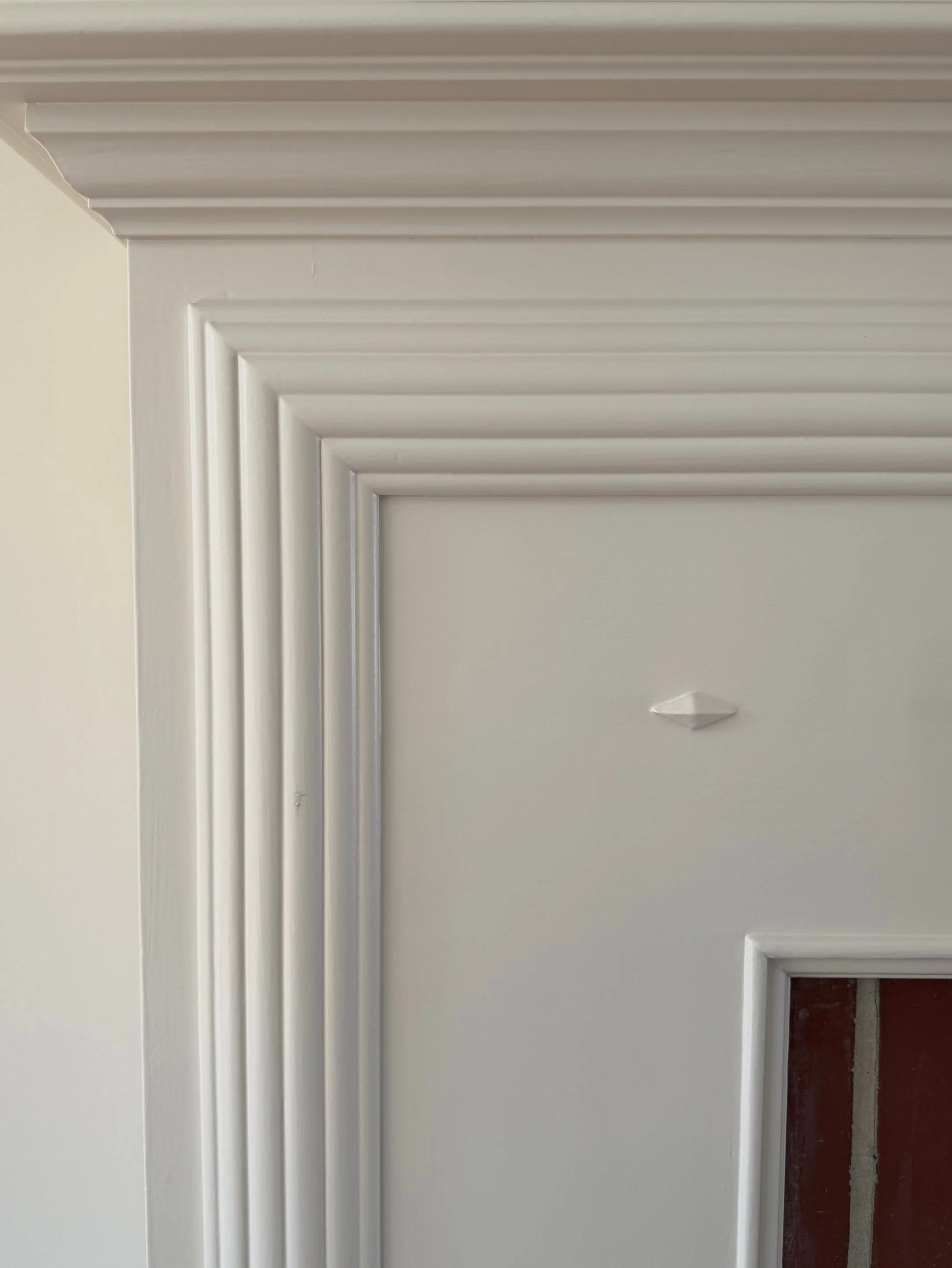 Detail of custom crown molding and door trim — Discovery Park, Seattle whole-home addition