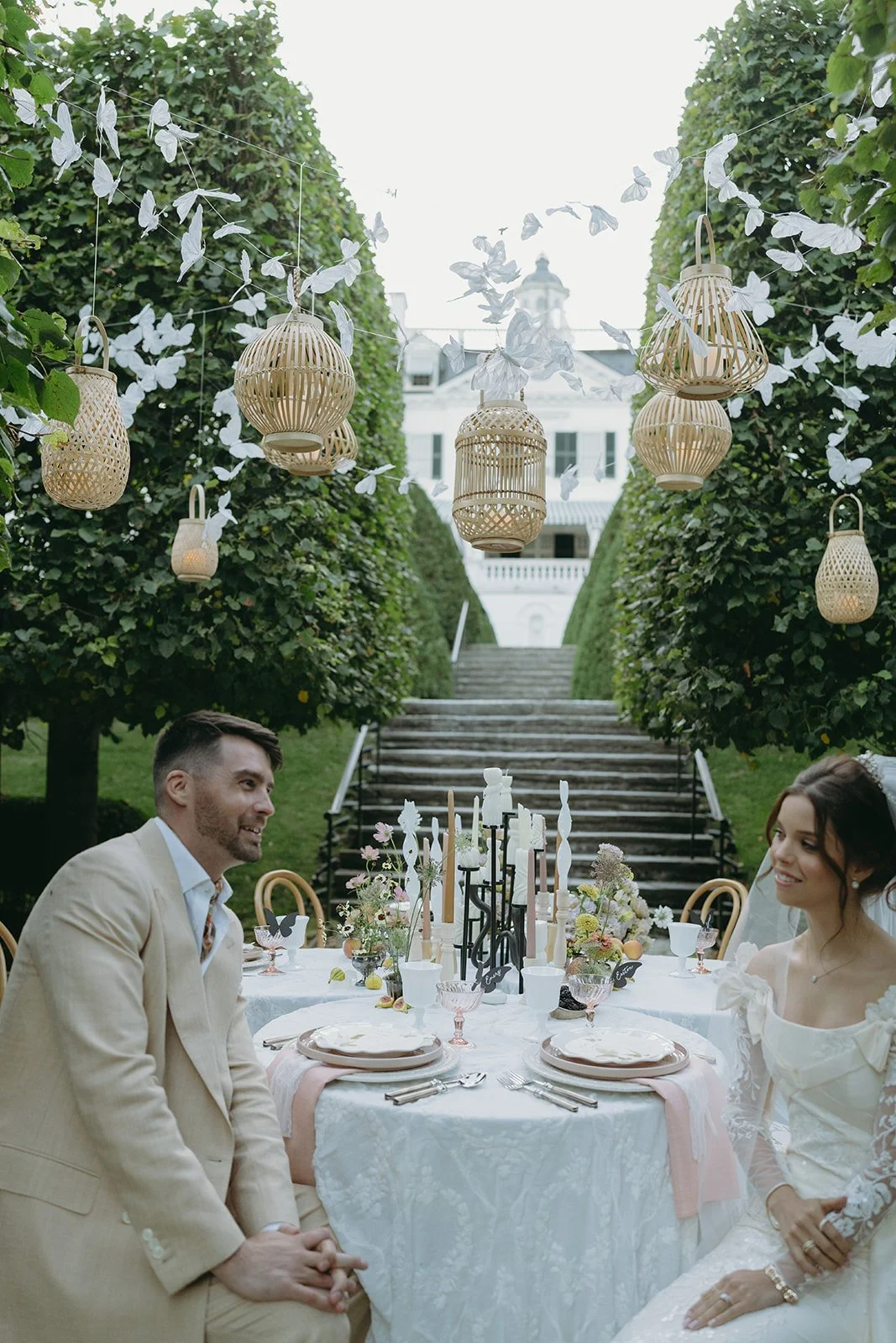 Bamboo lantern and butterfly light installation in the Lime Walk at The Mount, Lenox MA, by Berkshire Event Lighting.