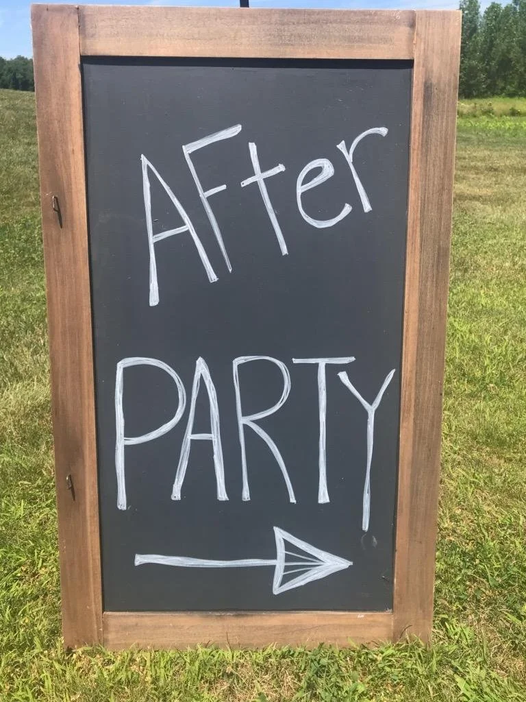 Large customizable chalkboard sign for wedding seating charts and menus by Berkshire Event Lighting.