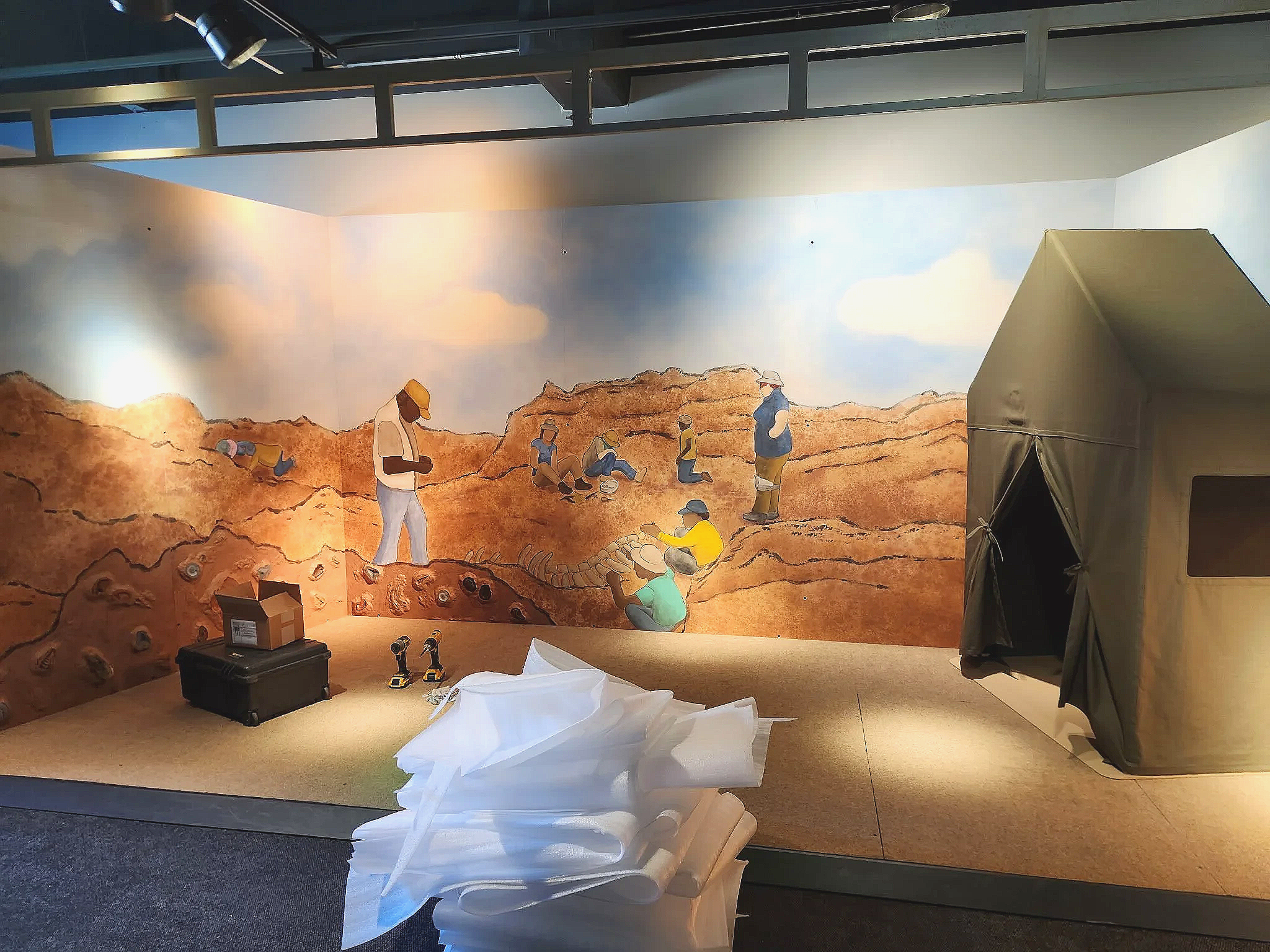 Dino Dig Site for Kaleideum Kids Museum in Winston-Salem, NC before prop elements done by Majestic Scenic. (2026) Worked on a scenic team of five. Charge Scenic: Jessica Holcombe
