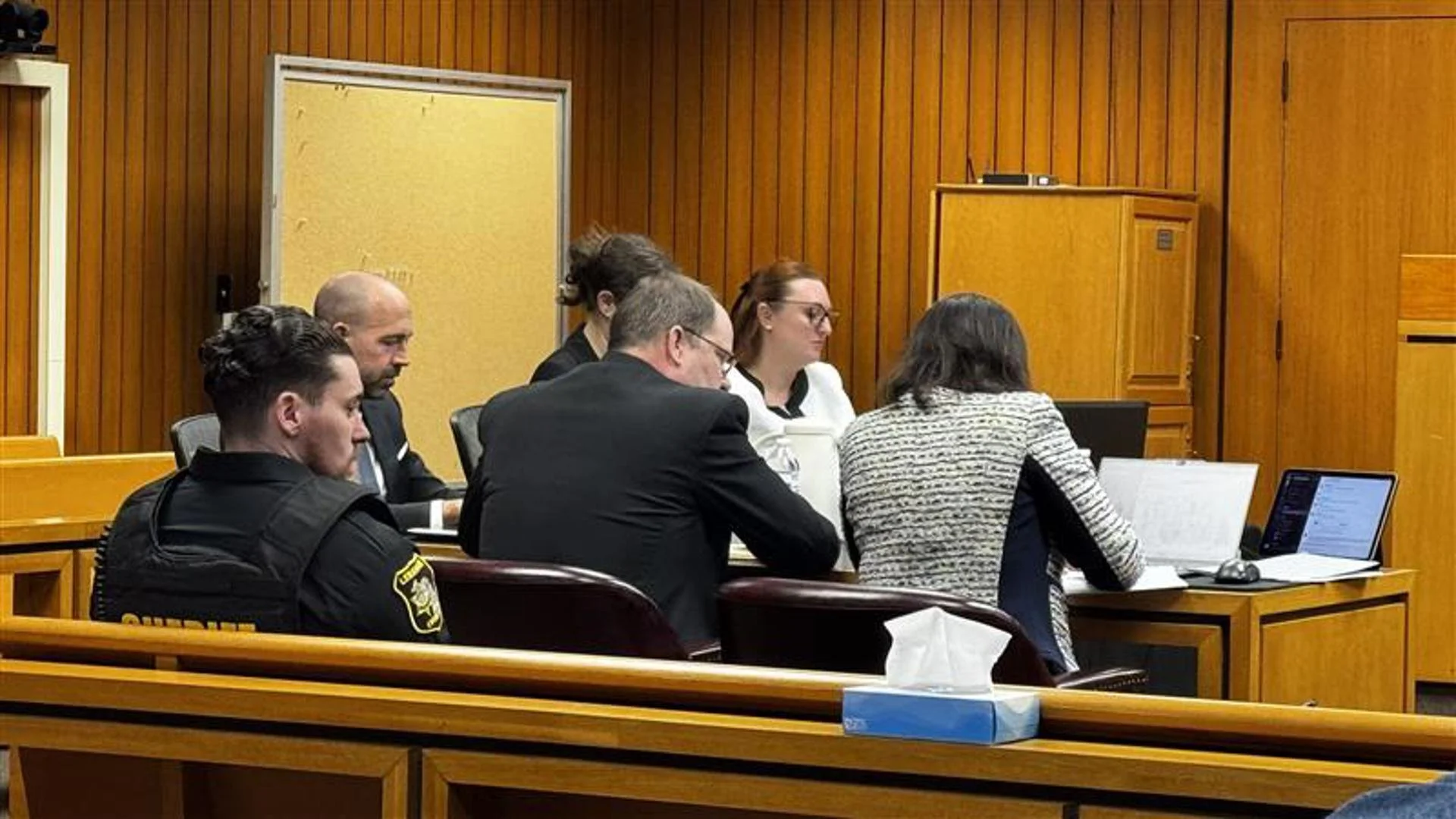 man and attorneys in court