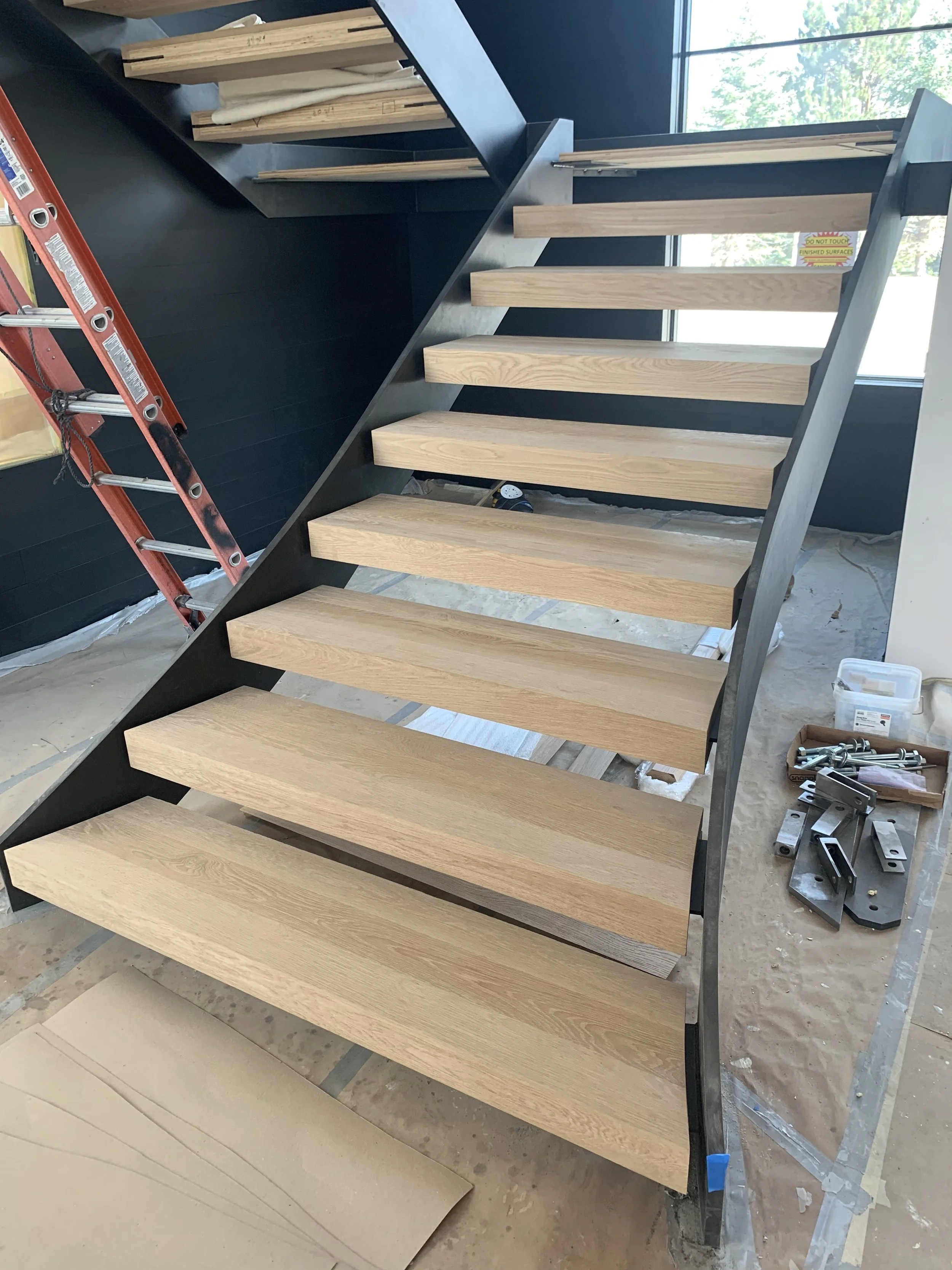 I designed this stair case to flare out at the bottom since there was so much space. 