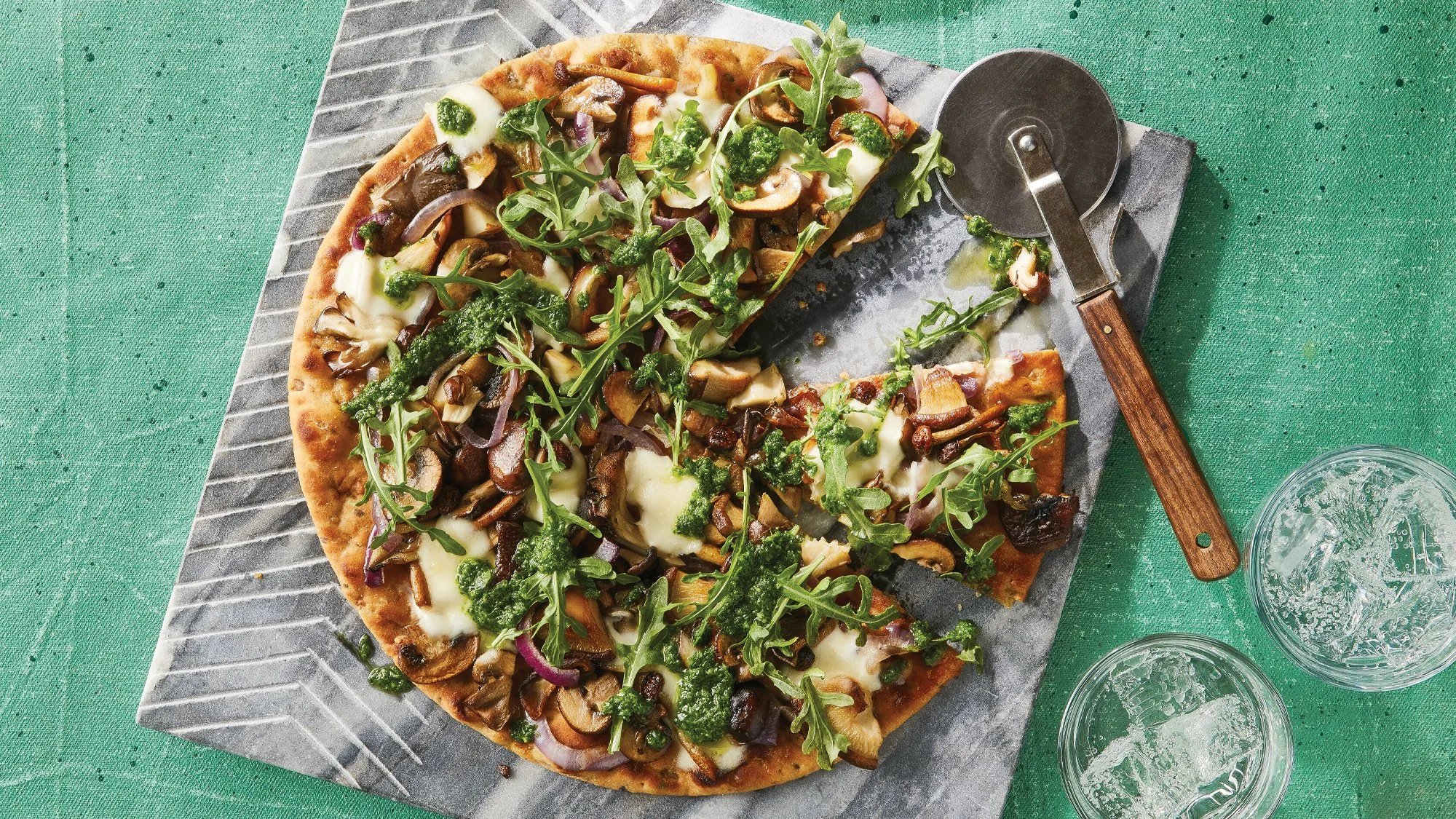 CleanEating_CE102Spring2022_Mezze_Wild-Mushroom-Flatbread-with-Basil-Oil-Drizzle_web.jpg