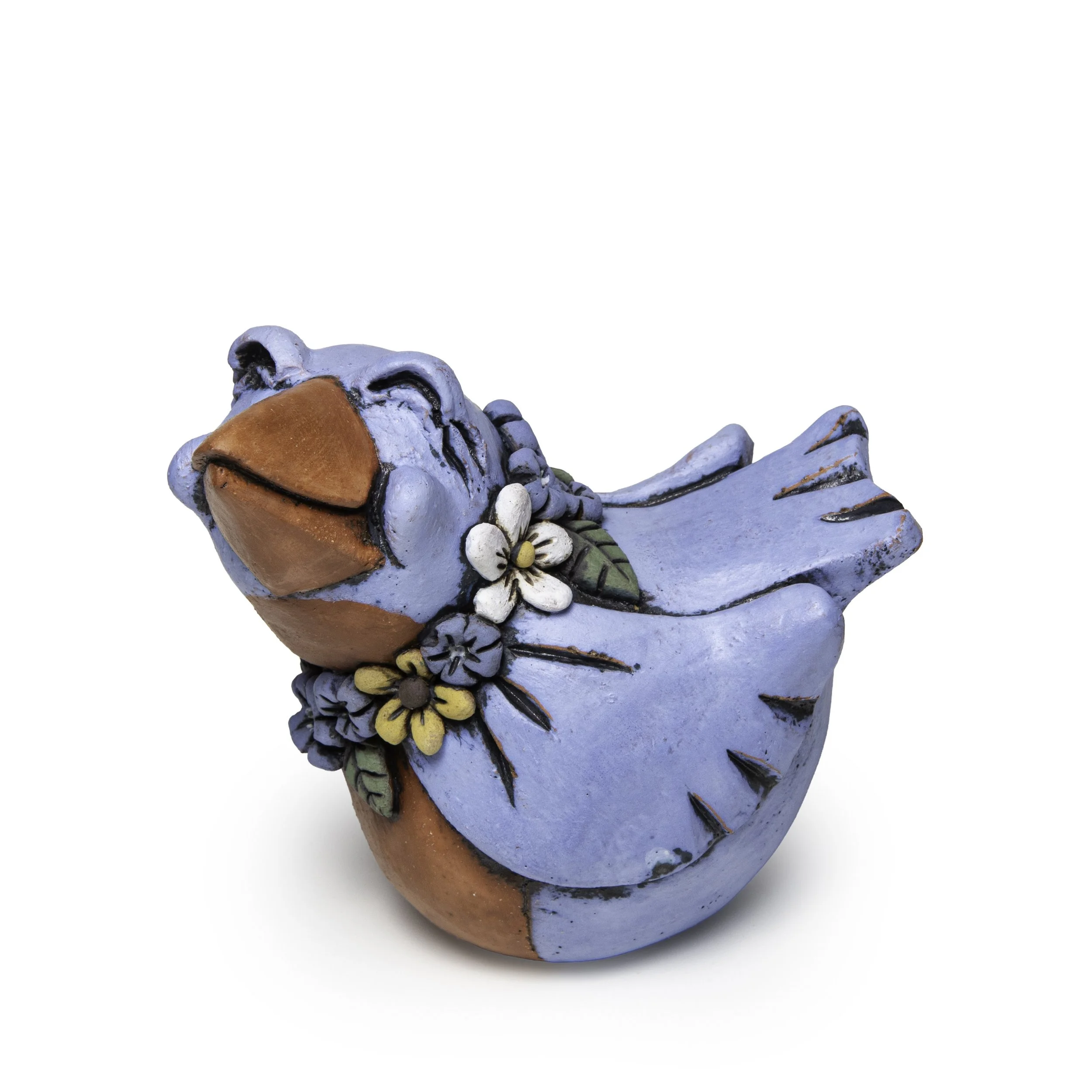 A bust sculpture of a white woman with blonde hair and blue birds in her hair and on her shoulder by Lisa Joerling. Image by Loam, LLC
