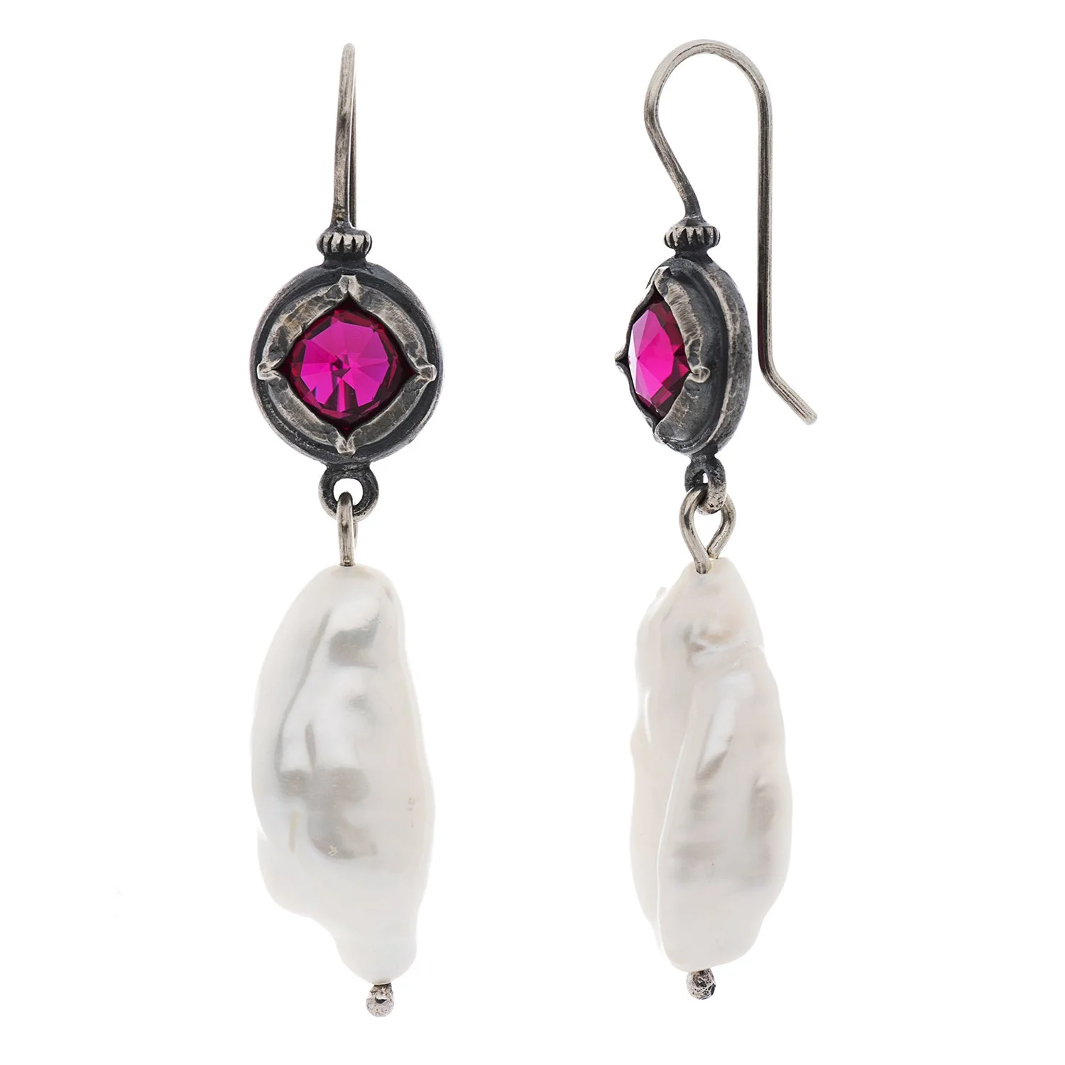 Two dangling earrings, one from the front and one from the side with rubies and long freshwater pearls against a white background. Piece by jewelry artist Stacey Lane, image by Loam, LLC