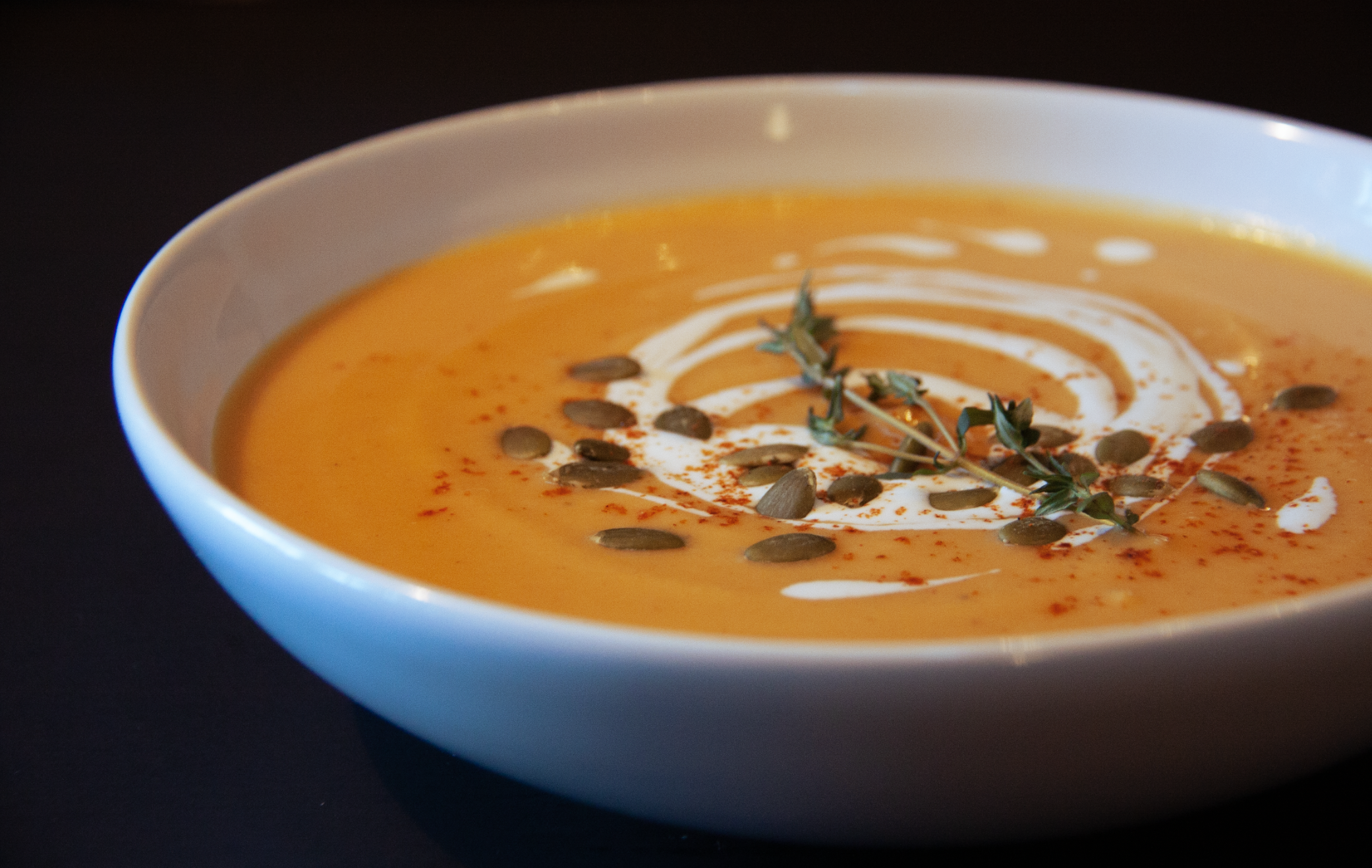 squash soup with toasted pumpkin seeds