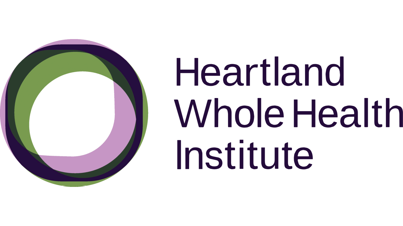 Logo of Heartland Whole Health Institute with a circular design made of green and purple overlapping shapes and the name written beside it.
