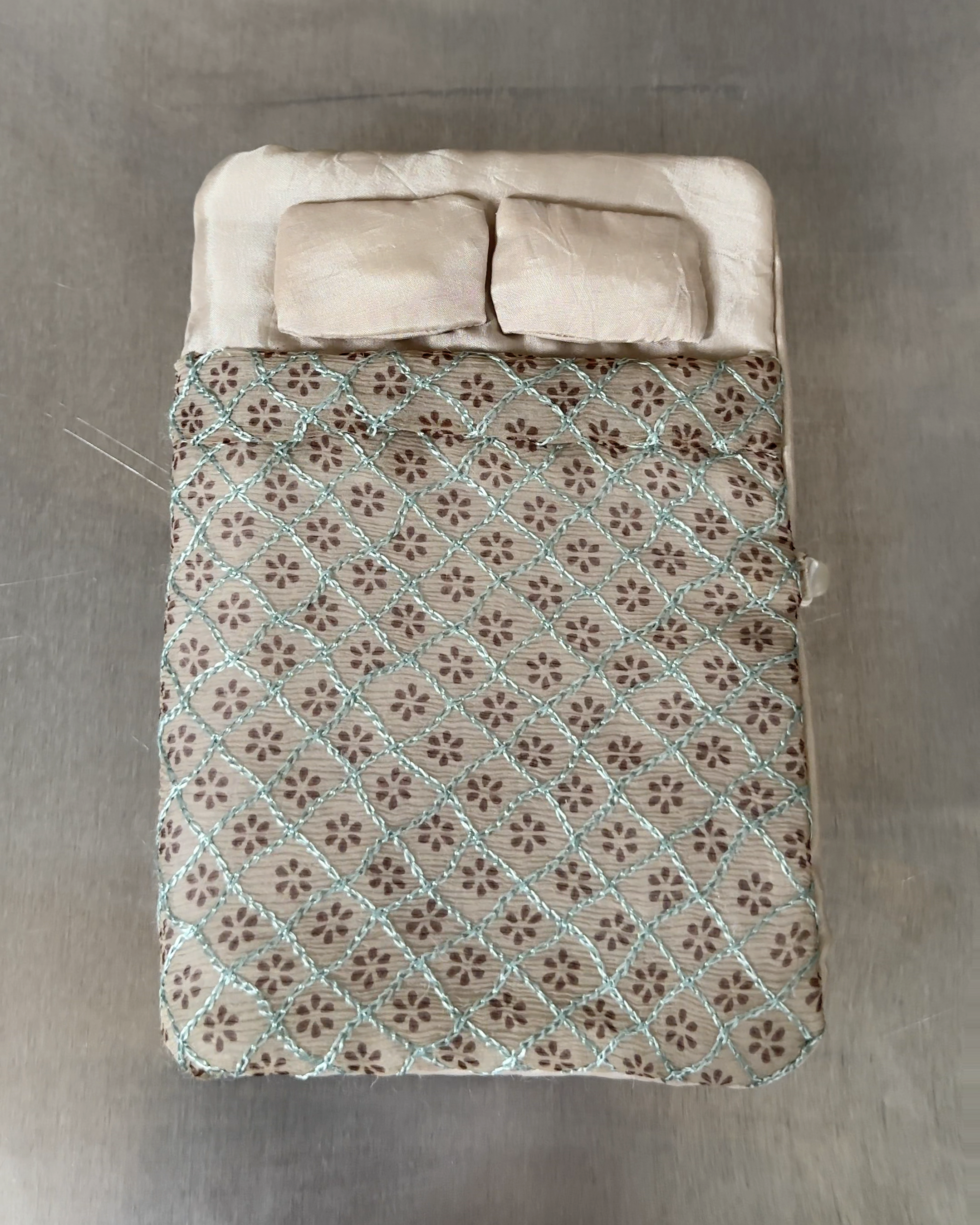 a reclaimed silk quilted puffy refillable journal.png