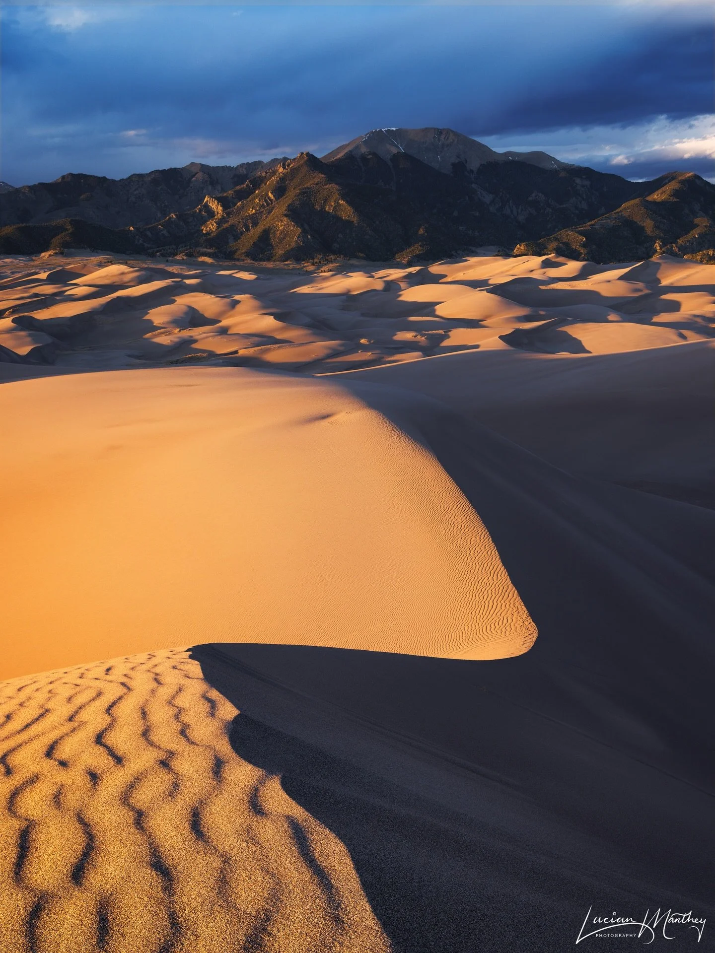 High Dune Sunset

This week I headed down to the San Luis Valley in southern Colorado. Taking advantage of the warm weather and clear skies, my main goal was to photograph the Milky Way over the Great Sand Dunes. One evening, I was treated to this sp