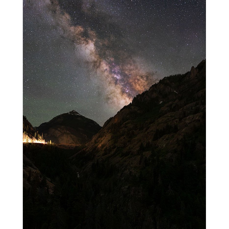 The Milky Way galaxy rises over the rugged cliffs and valleys of Red Mountain Pass near Ouray, Colorado, on a clear summer night.