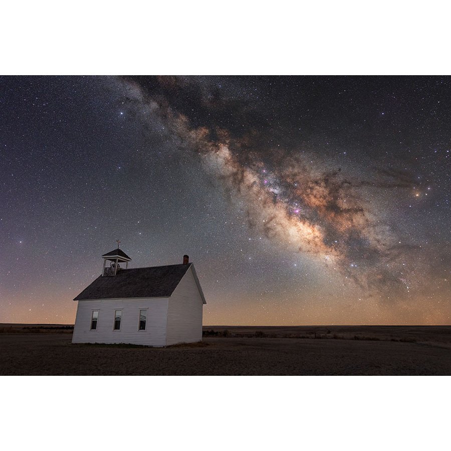 The Milky Way at night over a church on the Great Plains.
