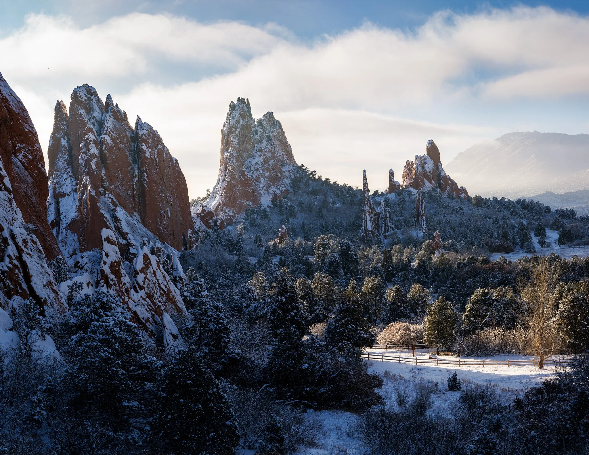 Fresh snow on the red sandstone spires of Garden of the Gods at sunrise, Colorado Springs, Colorado.