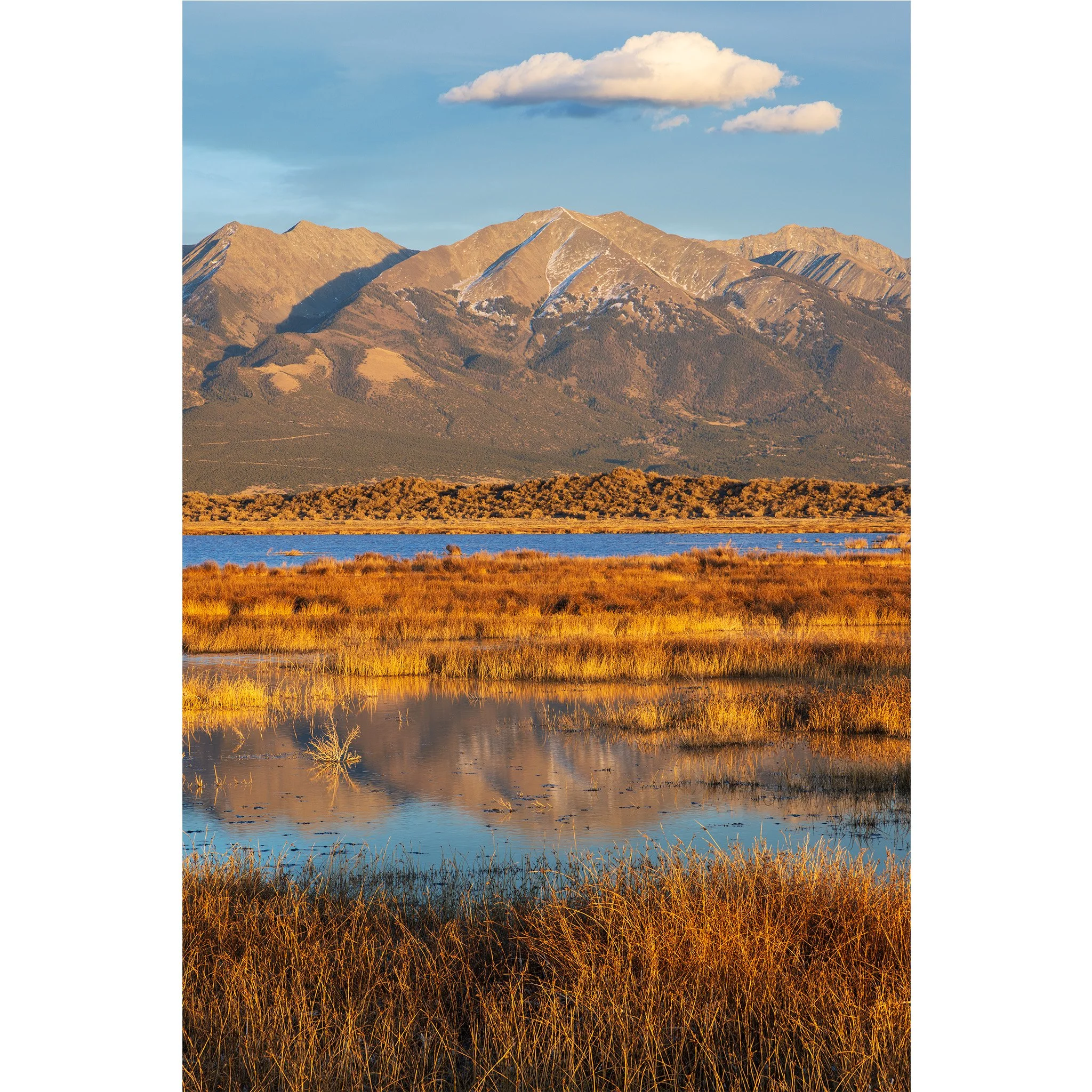 Sangre de Cristo Mountains at sunset reflected in San Luis Lake, San Luis Valley, Alamosa County, Colorado.