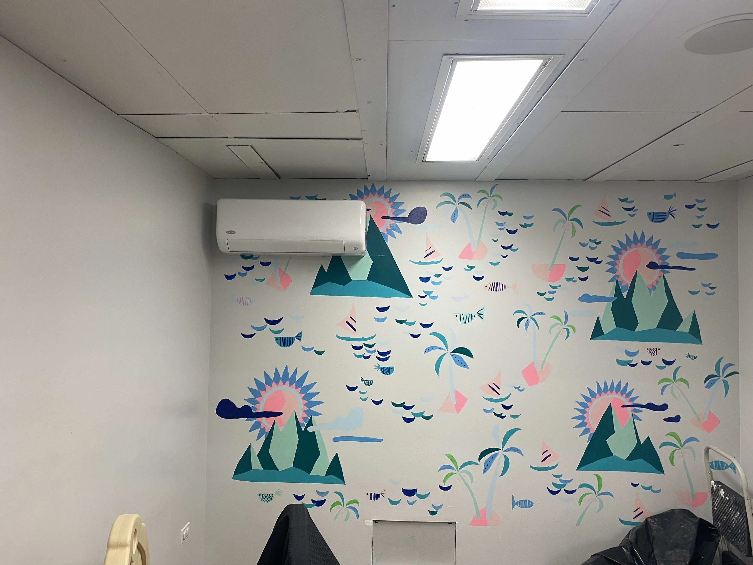 Interior view of installed mini split AC unit, wide shot