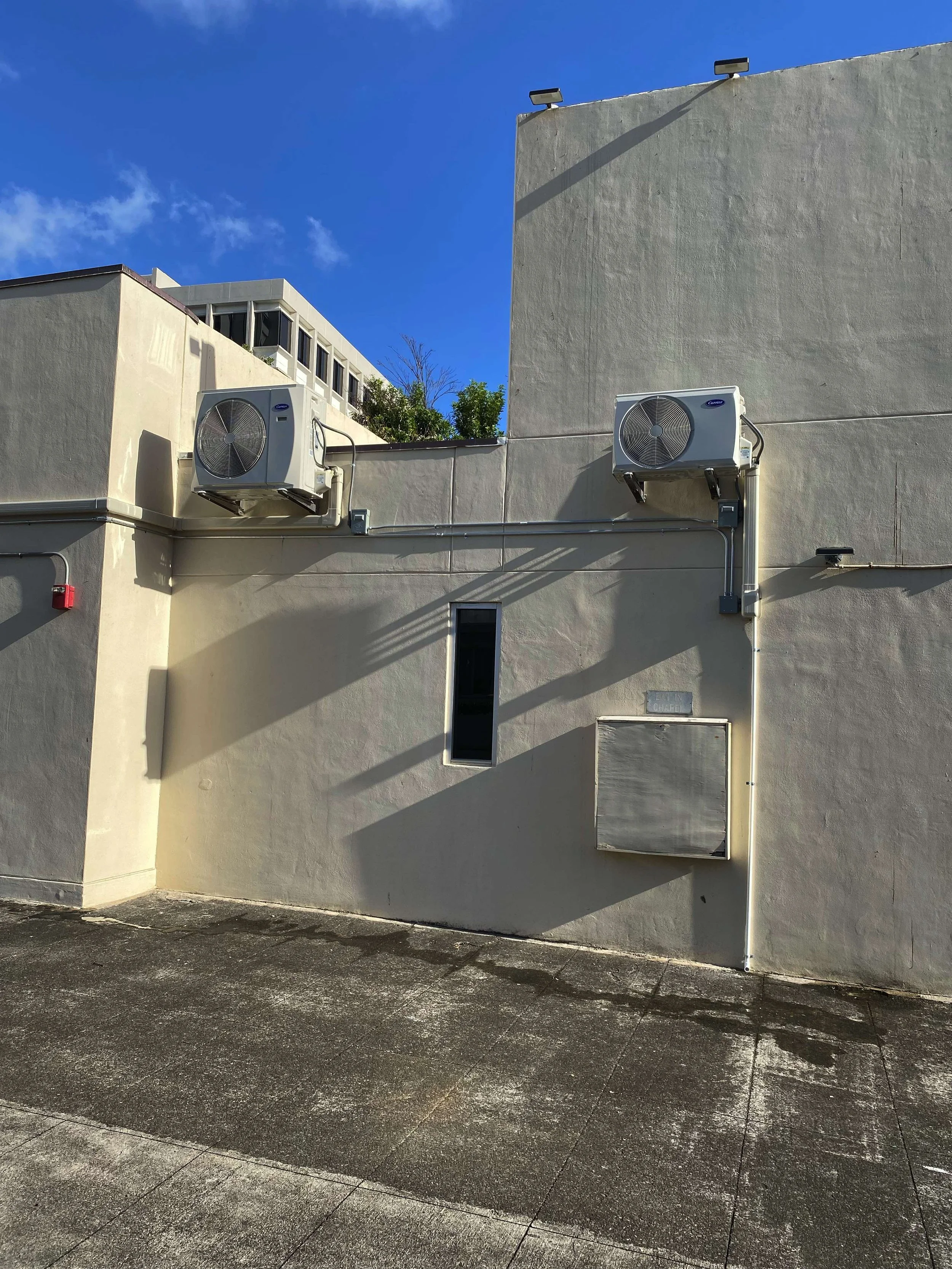 Closer look at two of the four outdoor AC units on the rooftop