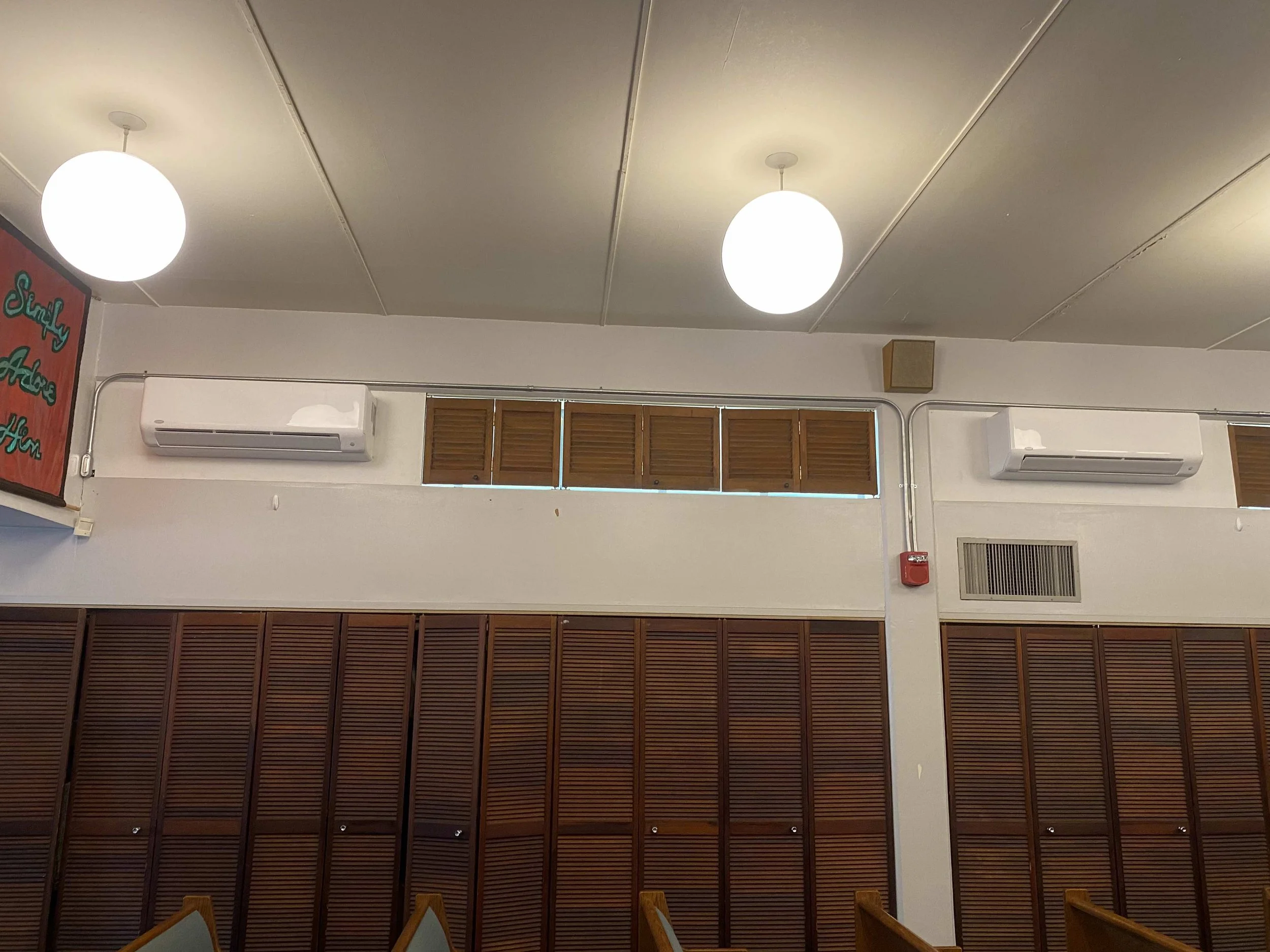 New mini-split AC installed on indoor window board.