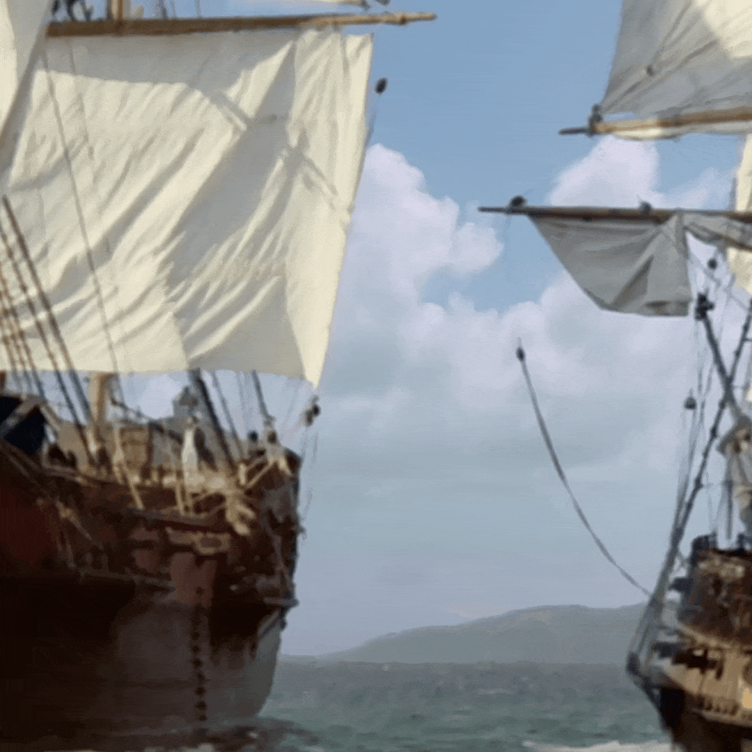 Ships-cannons-at-sea.gif