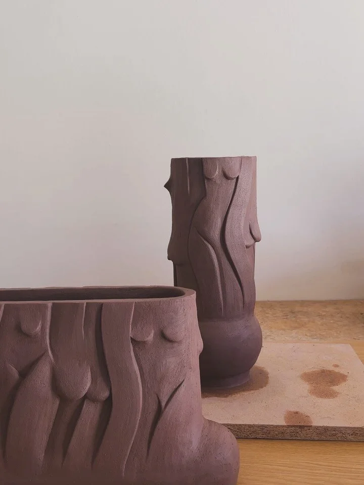 I love how this collection of sculptural vessels is slowly coming together. Exploring new forms to carry that soft, feminine relief work. Each piece feels like its own quiet story in clay. Catalogues coming together for 2026👌🏻✨💛
