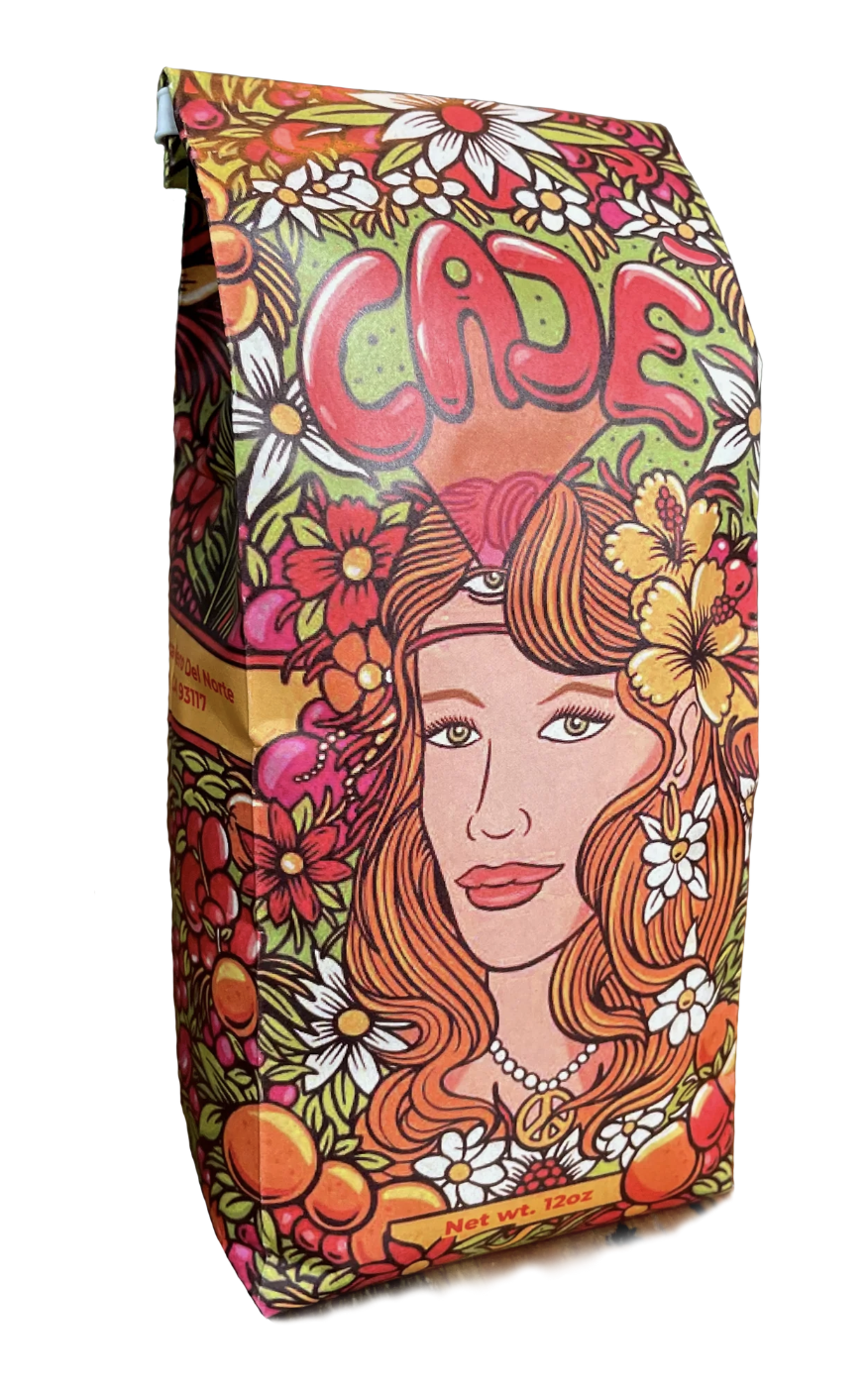 coffee pack for Cajè Coffee Santa Barbara picturing an illustrated image of a blonde goddess named Venus, surrounded by flowers, plants, leaves and coffee beans