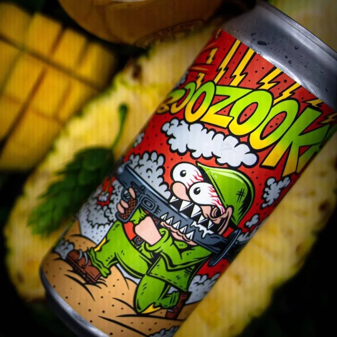 Grains of Virtue beer can design picturing a crazy soldier firing out beer hops from a bazooka