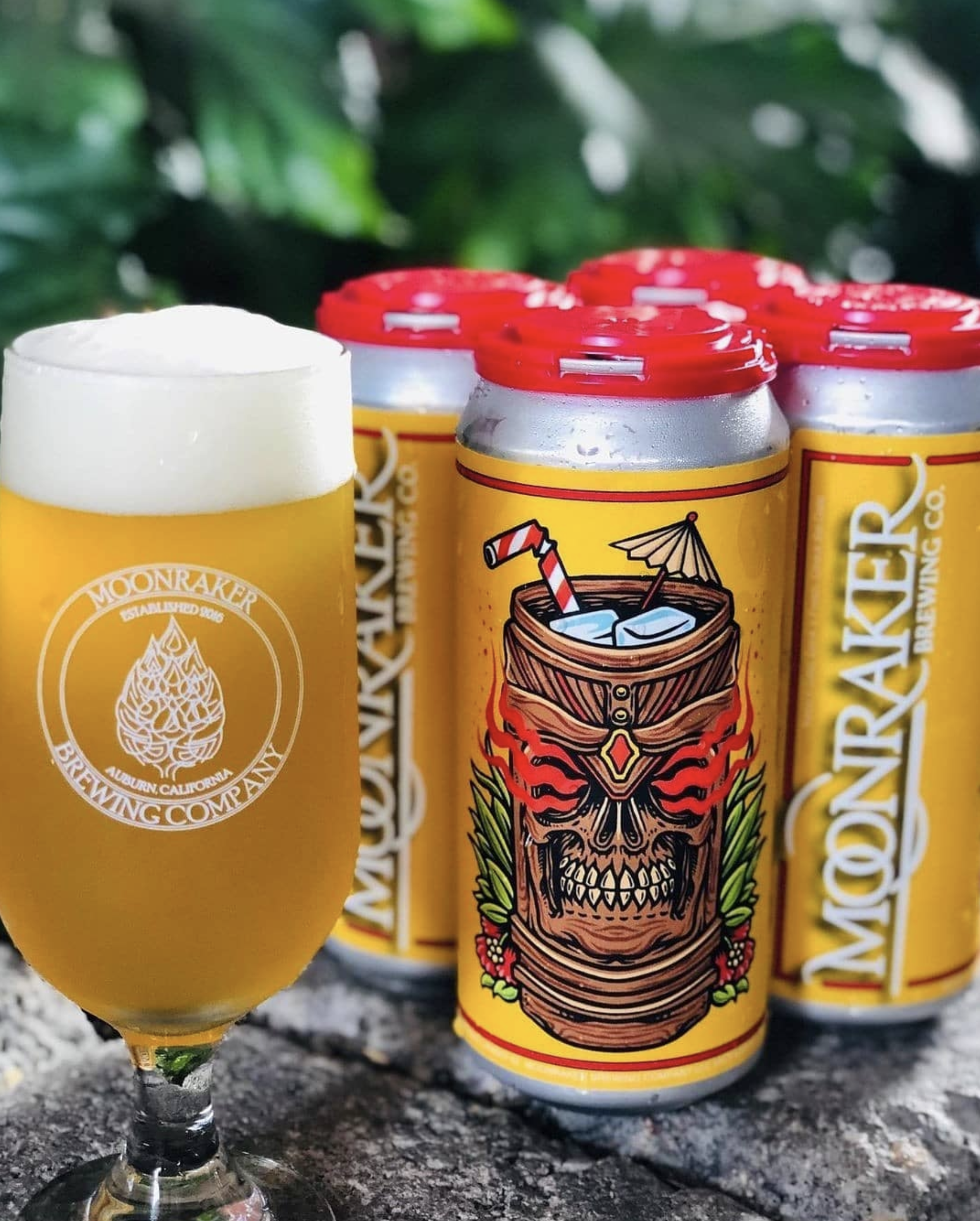 Moonraker Brewing beer can design, picturing a tiki wooden skull cup with flames coming out from its eye sockets