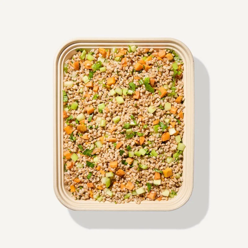 DIG Spiced Farro Tray with fresh vegetables and herbs, a hearty and healthy side.