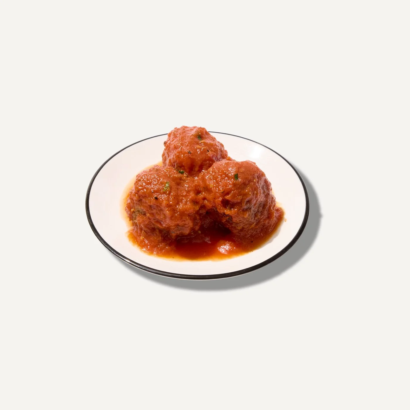 DIG Meatballs with Tomato Ragu, featuring hearty meatballs in rich tomato sauce.