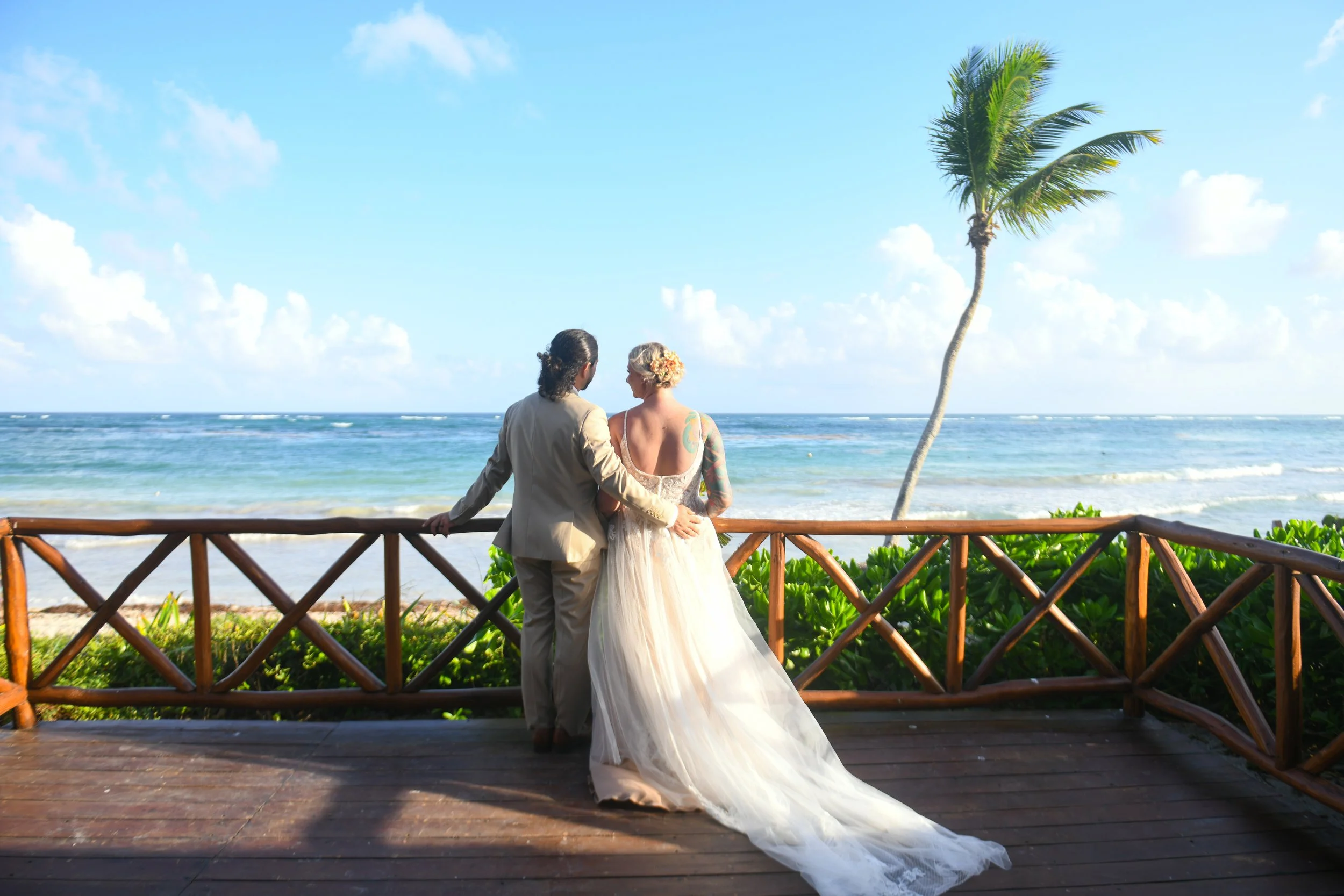 Destination wedding couple, wedding portrait ocean boardwalk, Secrets Tulum destination wedding