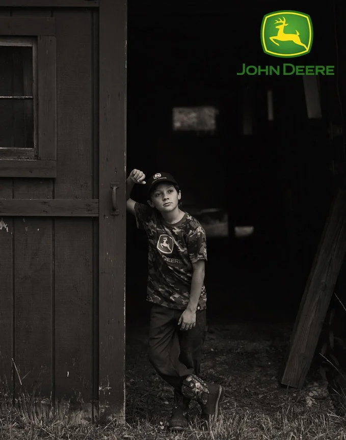 F-pete-thompson-photography-life-style-boy-farm-barn-john-deere.jpg