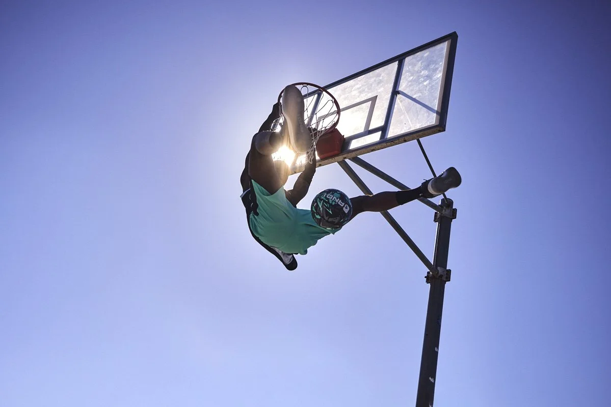 pete-thompson-photographer-life-style-sports-basketball-and1-dunk-hooper-backlit.jpg