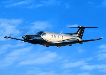Pilatus insured by 5X5 flying in the air