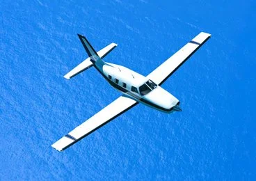 Piper insured by 5X5 flying in the air
