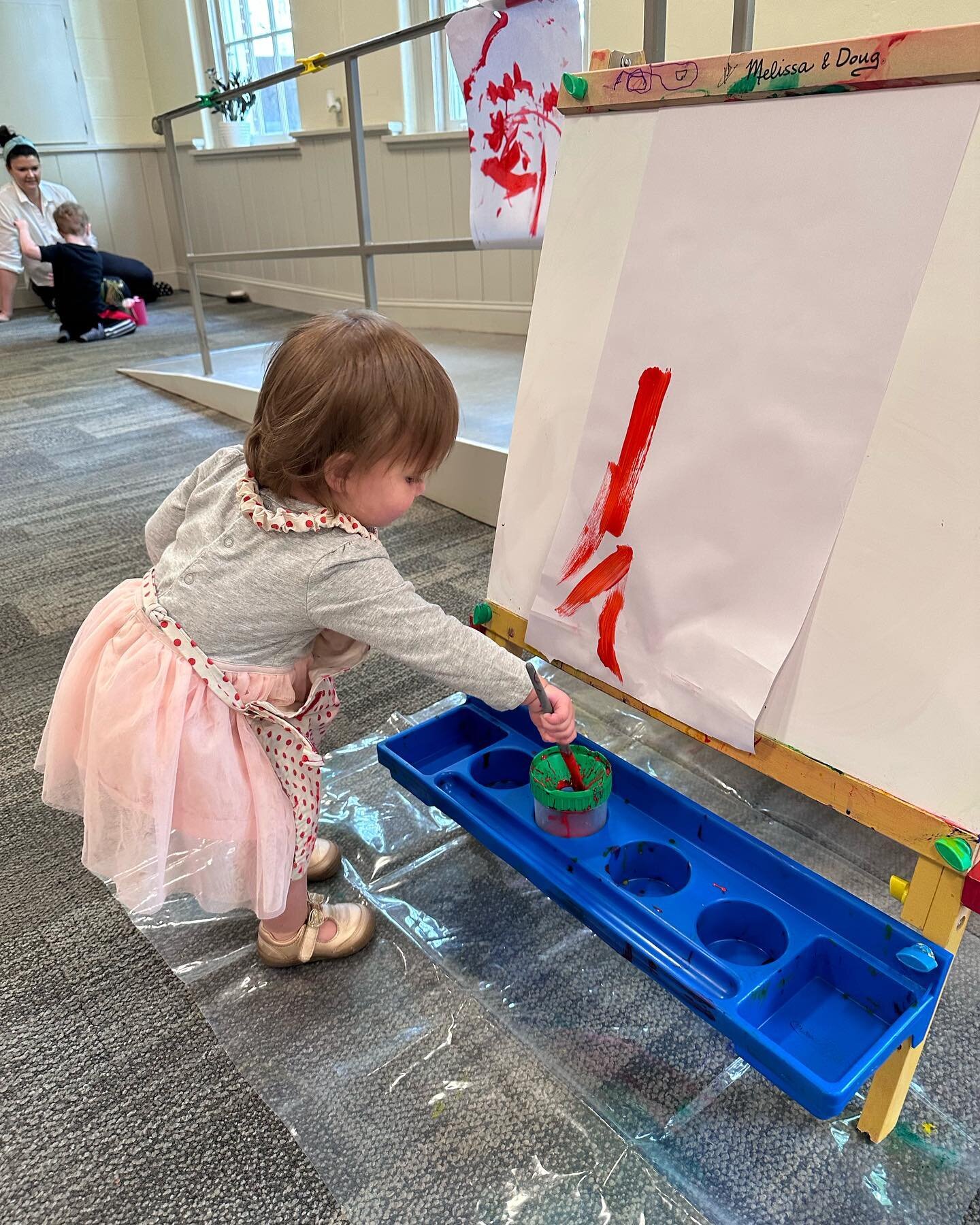 In Montessori we talk a lot about purposeful play or purposeful work. This picture shows a little one who on this day picked up the paint brush and painted on the easel for the first time that session! Her mom and I gasped in surprise and she snapped