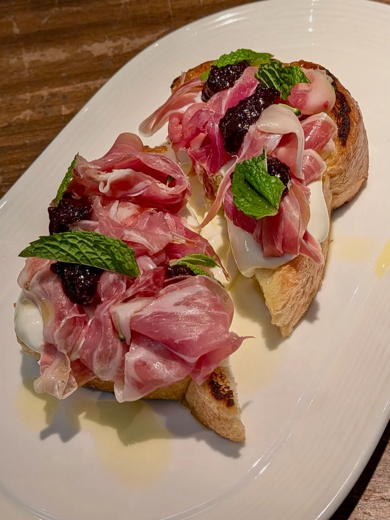 🍽️ An all new dinner menu launches at Barrett&rsquo;s this Wednesday, 8/26!

🤩 Think pizzas, pastas, and apps to share&hellip;.you will not want to miss this! 

😋 Pictured here; Prosciutto Toast, Ribeye, Stuffed Dates, Calamari

🗓️ DINNER | Tuesd