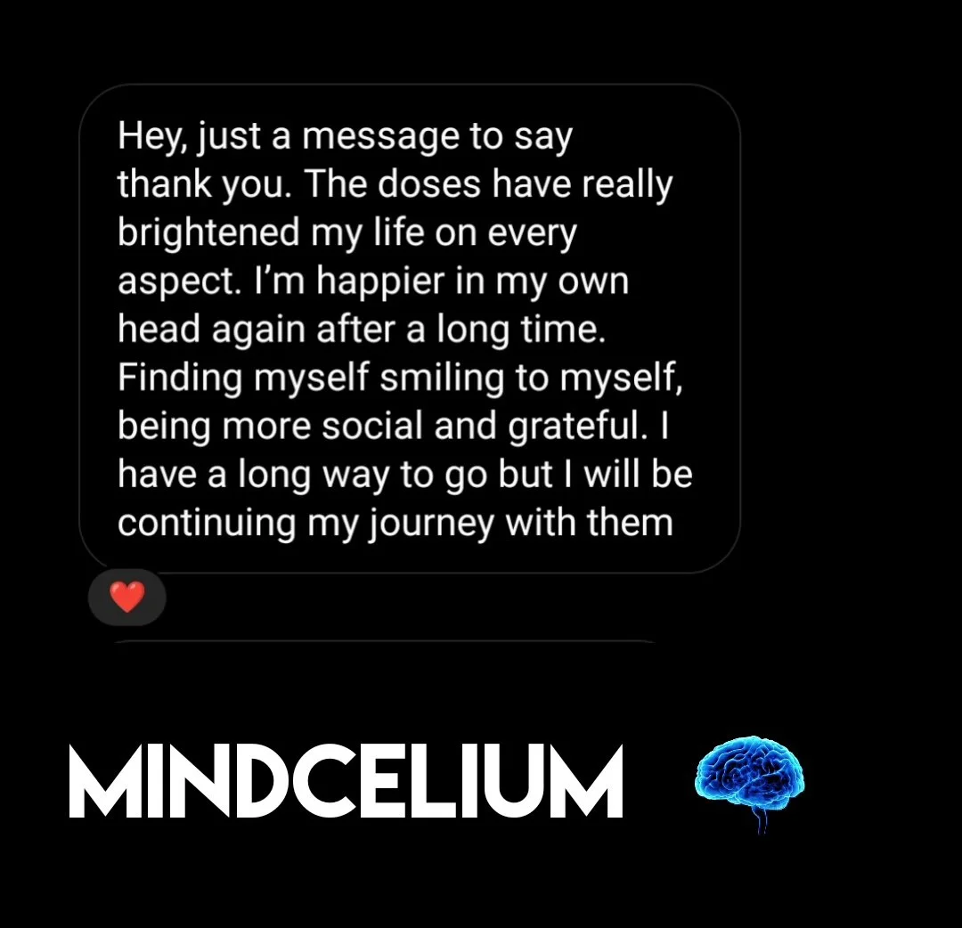 A social media post with a message expressing gratitude for receiving doses of a treatment, highlighting improved mental health and happiness, with a red heart icon below the message and the word "MINDELium" next to an illustration of a brain.