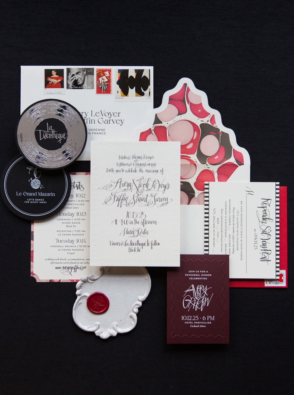 A custom wedding invitation suite designed for an elegant destination wedding in Paris. Featuring rich burgundy details, calligraphy, layered paper goods, and timeless typography by Emily Snyder
