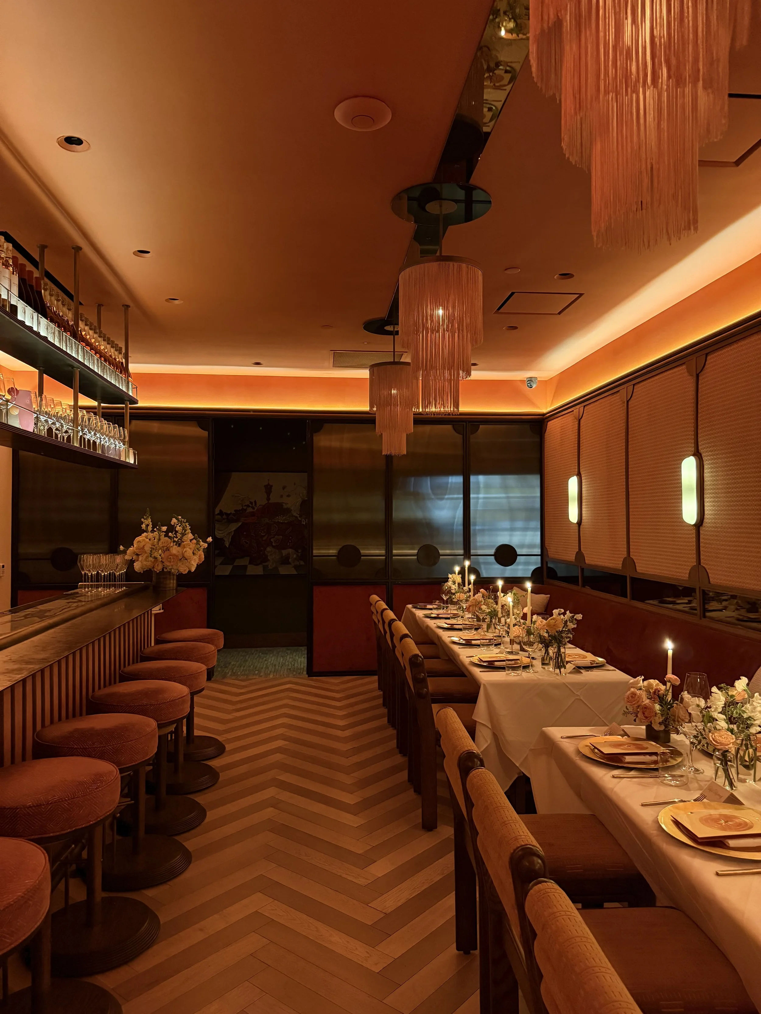 Candlelit Bulgari brand dinner with refined floral design, created by The Petaler Floral & Events Co., luxury event designers for American brands and weddings in France.