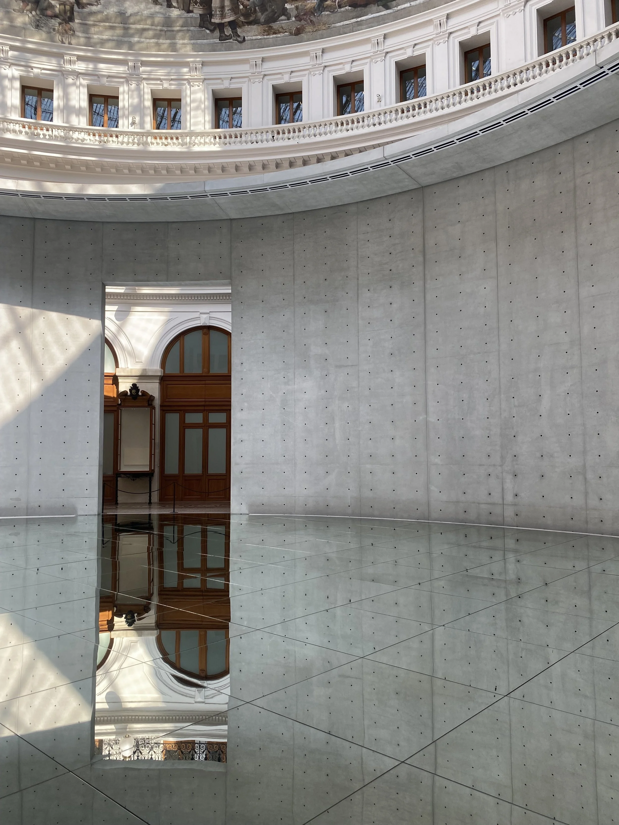 Modern architectural details inside the Bourse de Commerce in Paris, showcasing the art-led, editorial aesthetic of a luxury Paris wedding planner designing destination weddings for American couples.