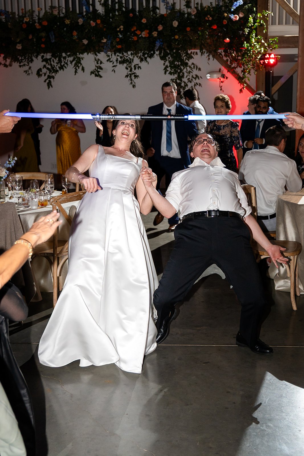The limbo can spice up any party ;) at The Barn of Chapel Hill at Wild Flora Farm, Photo by Gold and Sage Photography.