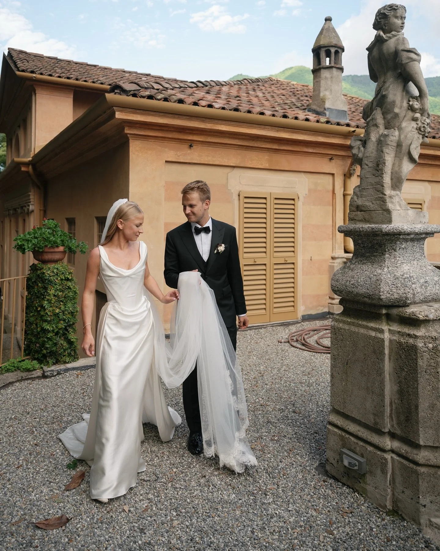a blend of film and digital from lake como xo

planning &amp; design @ashleysmithevents 
photographer @kristinpiteophoto 
venues @villapizzo @villalario 
floral @whitepepperstudio 
paper @plumecalligraphy 
dress @viviennewestwood
hmua @thestudiocomo
