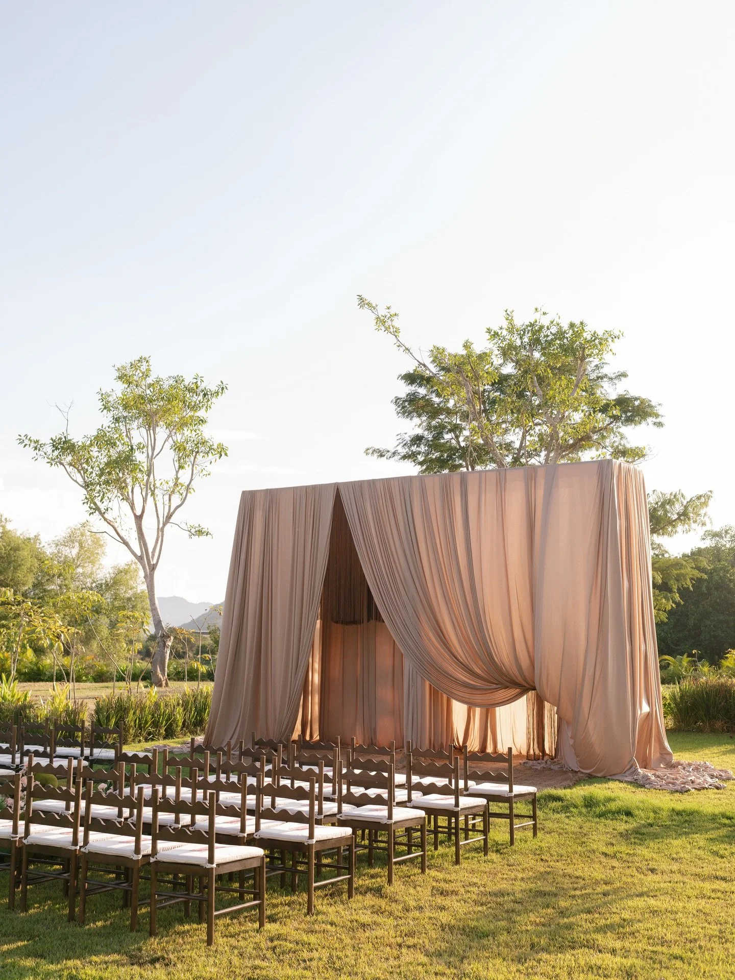 An ethereal ceremony imagined into form ~ grand in scale yet intimate in feeling. Sculptural draping, soft light, and intentional design creating a moment that feels both grounded and otherworldly.

Planning &amp; Design @maeandco_creative 
Venue @ro