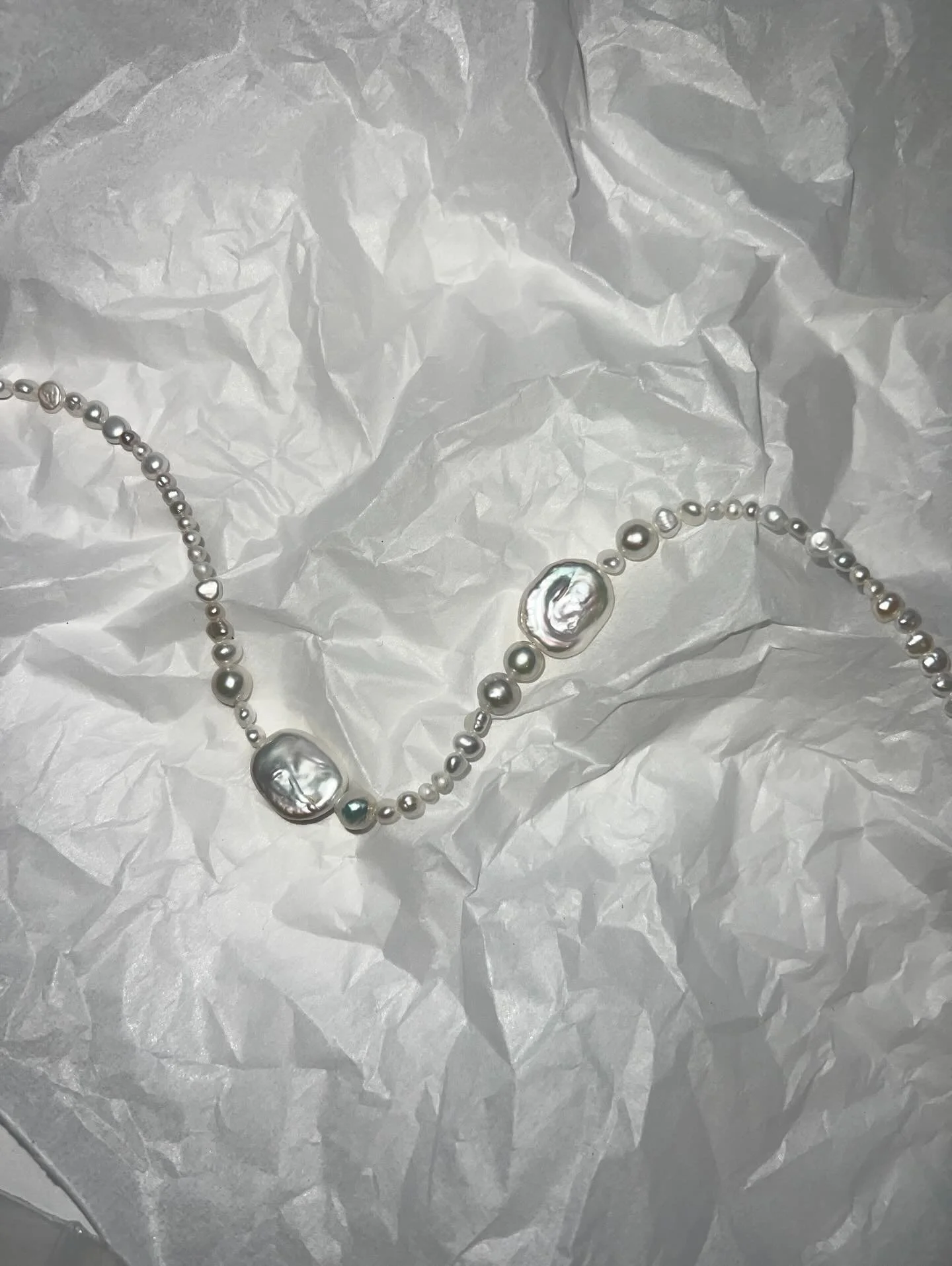 Each Poem Pearl Necklace is handmade to order from our Melbourne studio. Rhythmic and lustrous, our Poem Pearl pieces are made up of organic freshwater pearls varying in size and structure.

Available with either 14k Gold Filled or 925 Sterling Silve