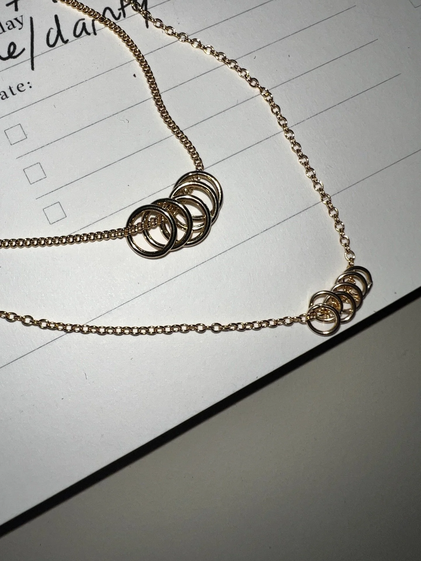 Can&rsquo;t stop thinking about the Mini Rings Necklace; The finer version of our best-selling Rings Necklace. Five tiny 5mm hand-soldered rings threaded onto our delicate 1.2mm Cable Chain.

Handmade to order from our Melbourne studio.

Get 10% off 