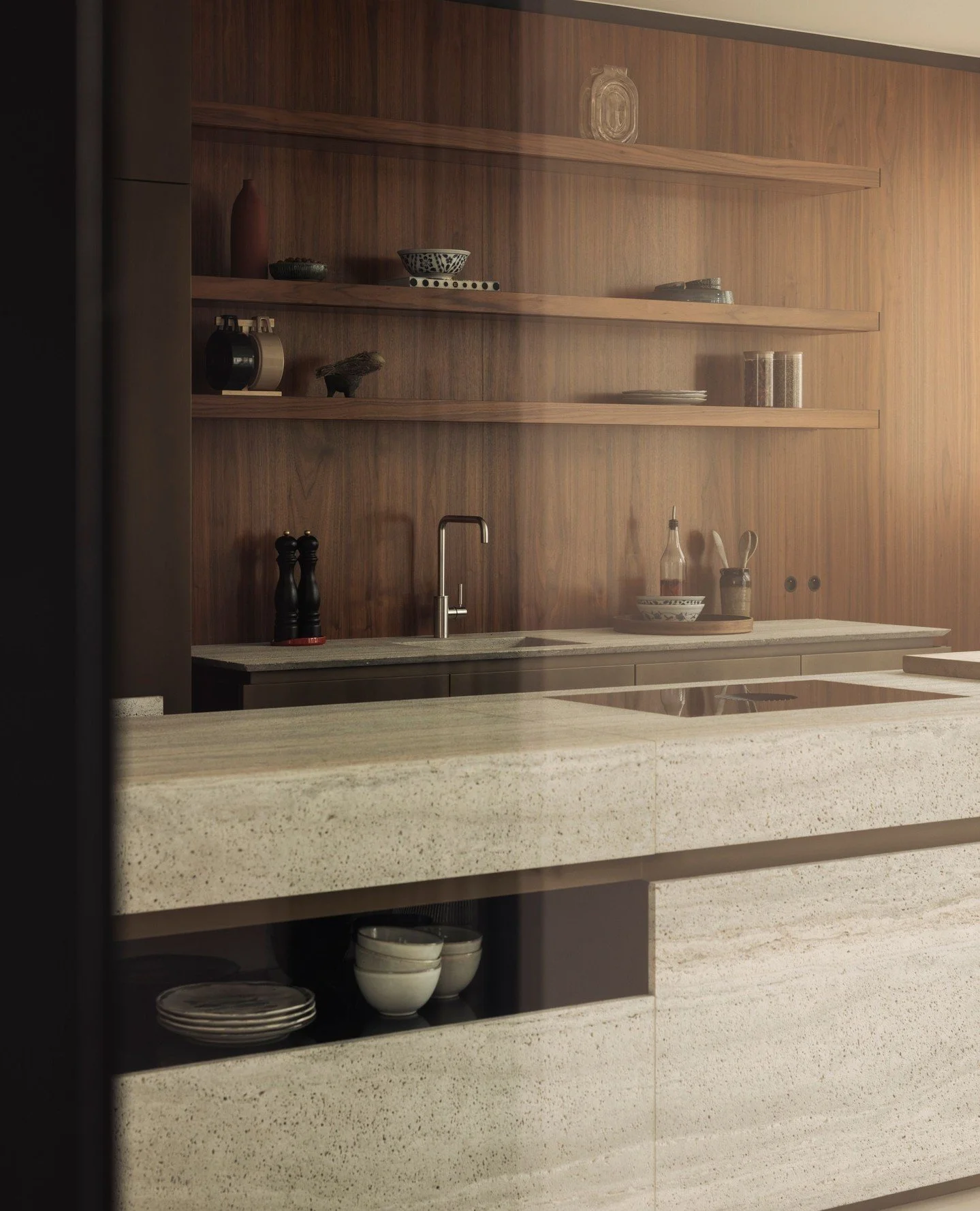 Kitchen views from Merijn Degraeve's Maison Mattelin, a walnut-veneered feature wall, a travertine island with matching handles on the cabinets, black lacquered glass shelving, and bronze-lacquered cabinetry and recessed niches embedded into the isla