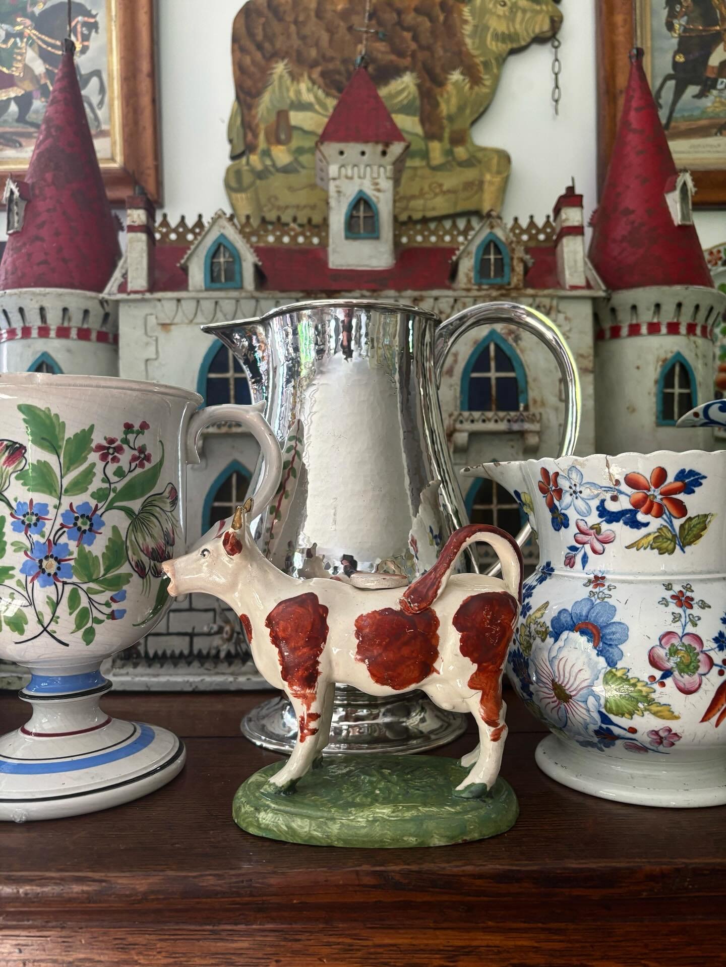 A few bits and pieces on the ever-changing kitchen sideboard. This little cow has the most beautiful moulding and needs to stay here for a while before heading onto Marland Home. 😊

#antiques #staffordshirepottery #folkartcastle #donpotteryjug #anti